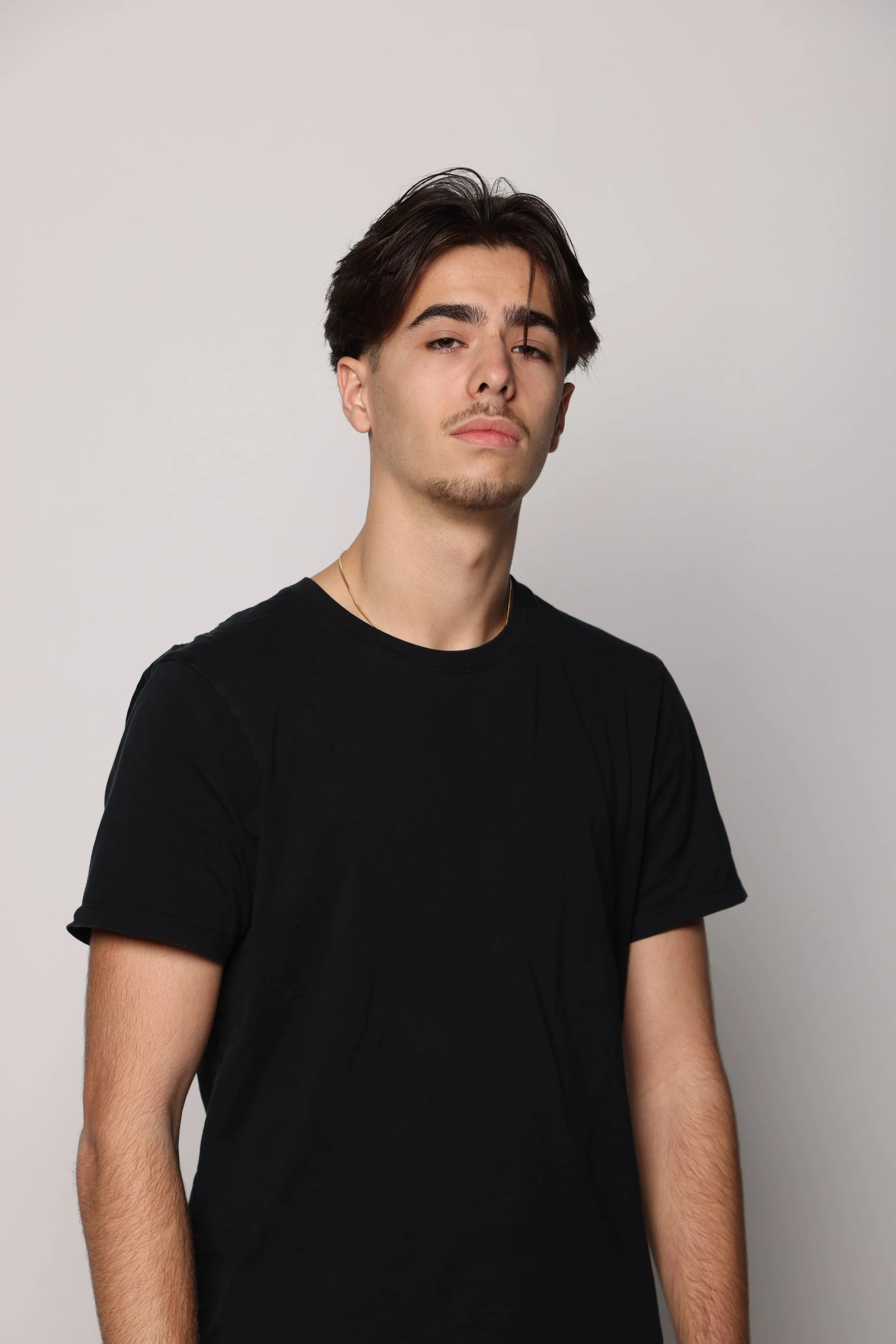 man black tshirt black jean smiling3.jpg