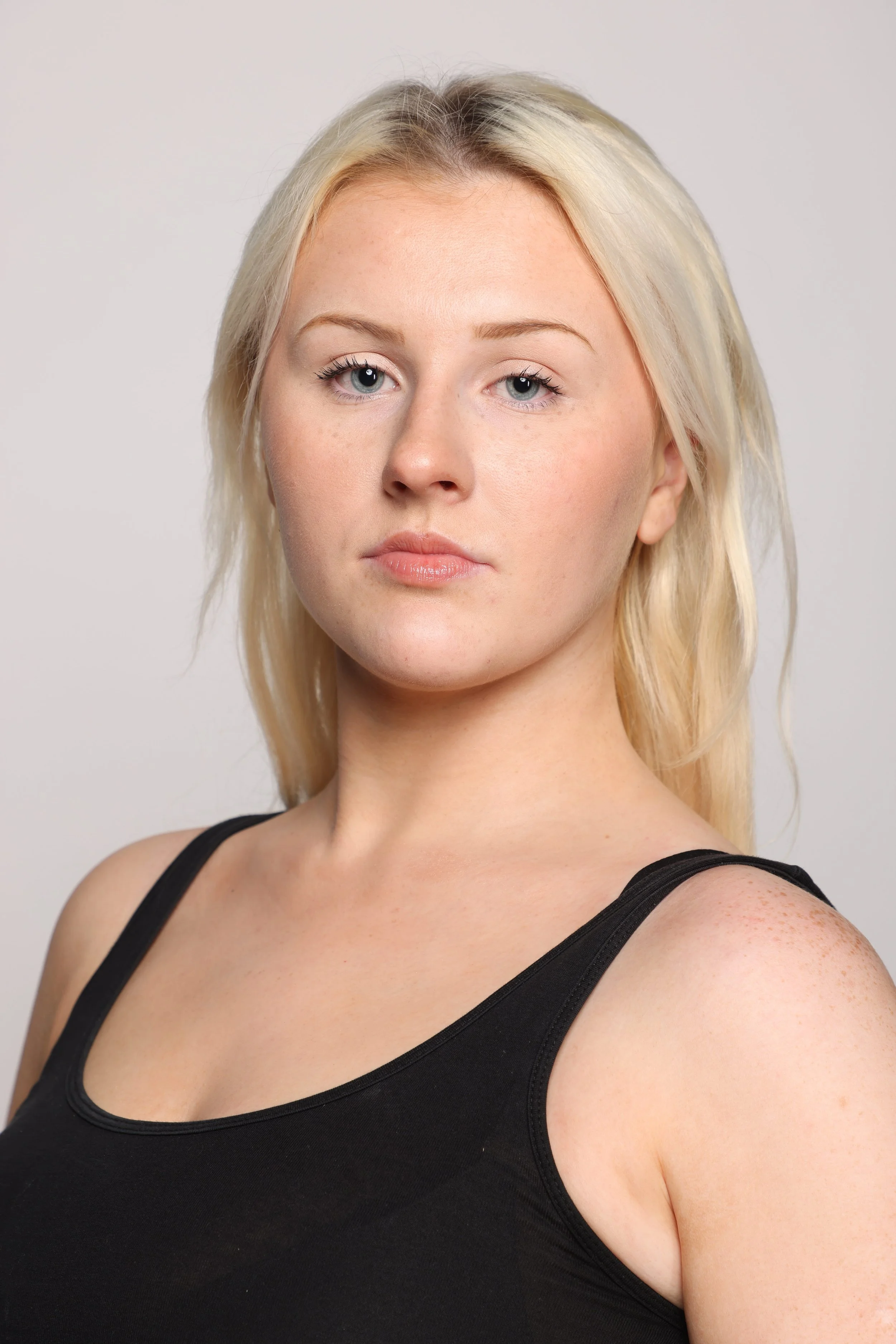 model in blonde hair black top (3).jpg