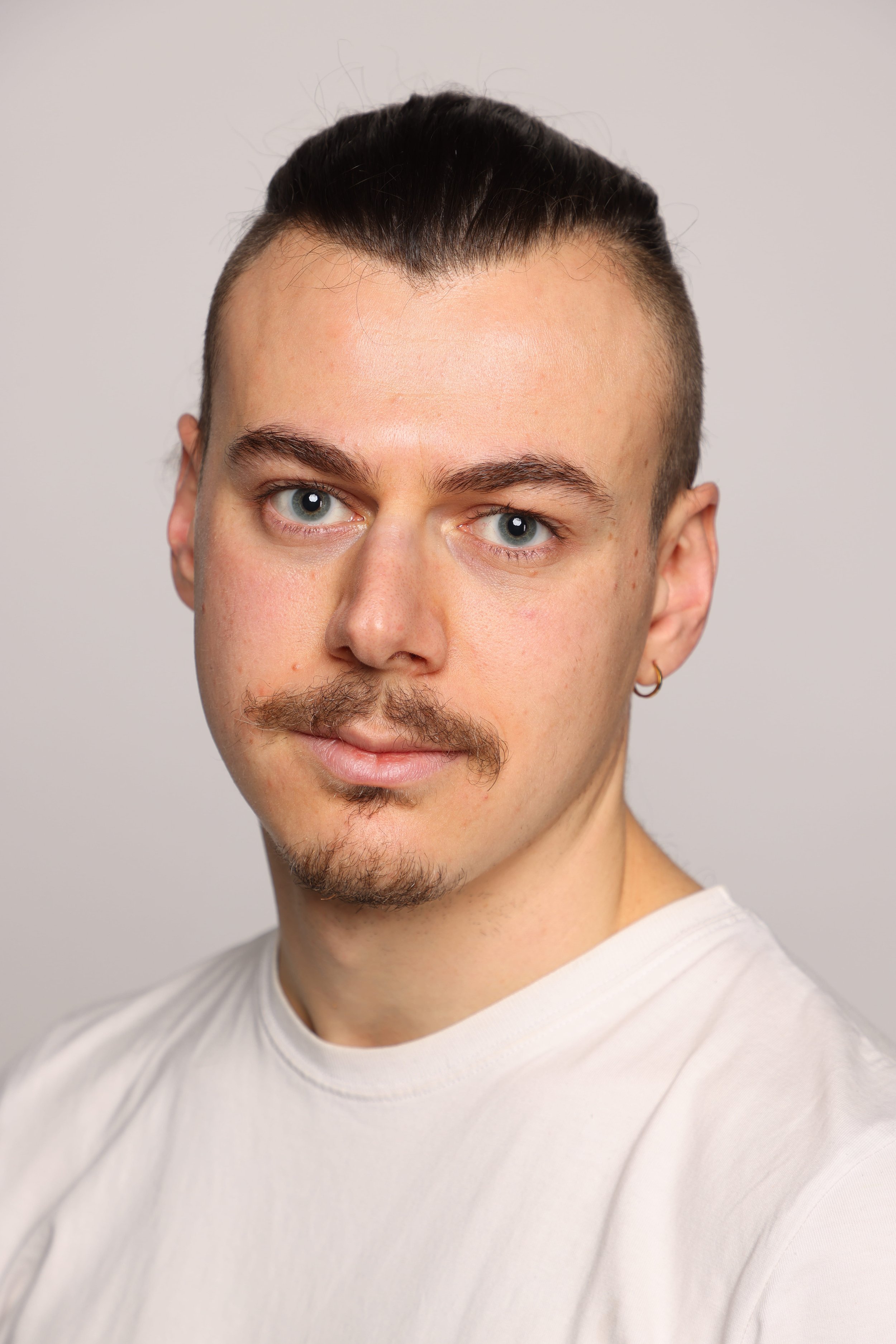 man white tshirt black jean smiling3.jpg