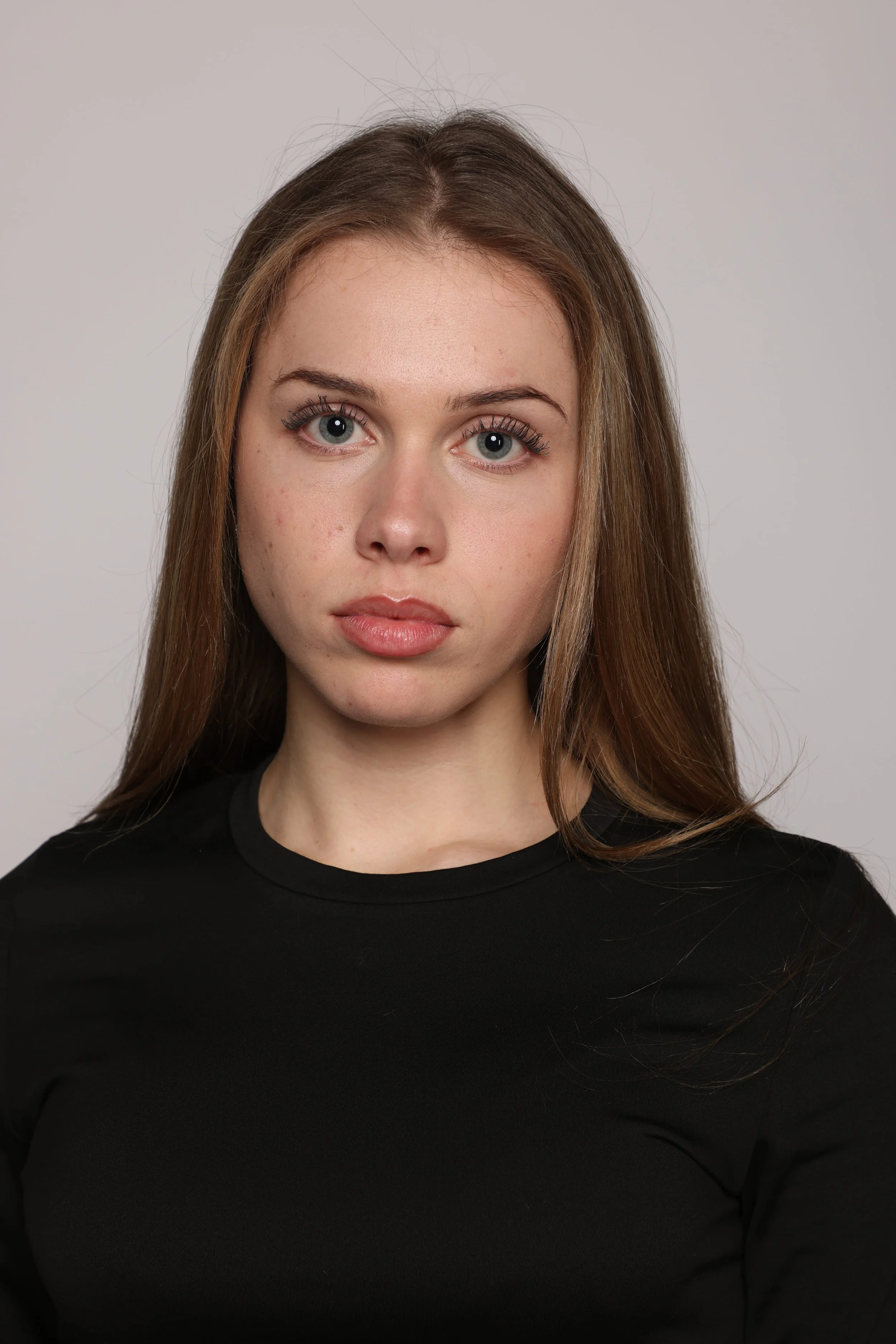 woman black tshirt black jean smiling4.jpg