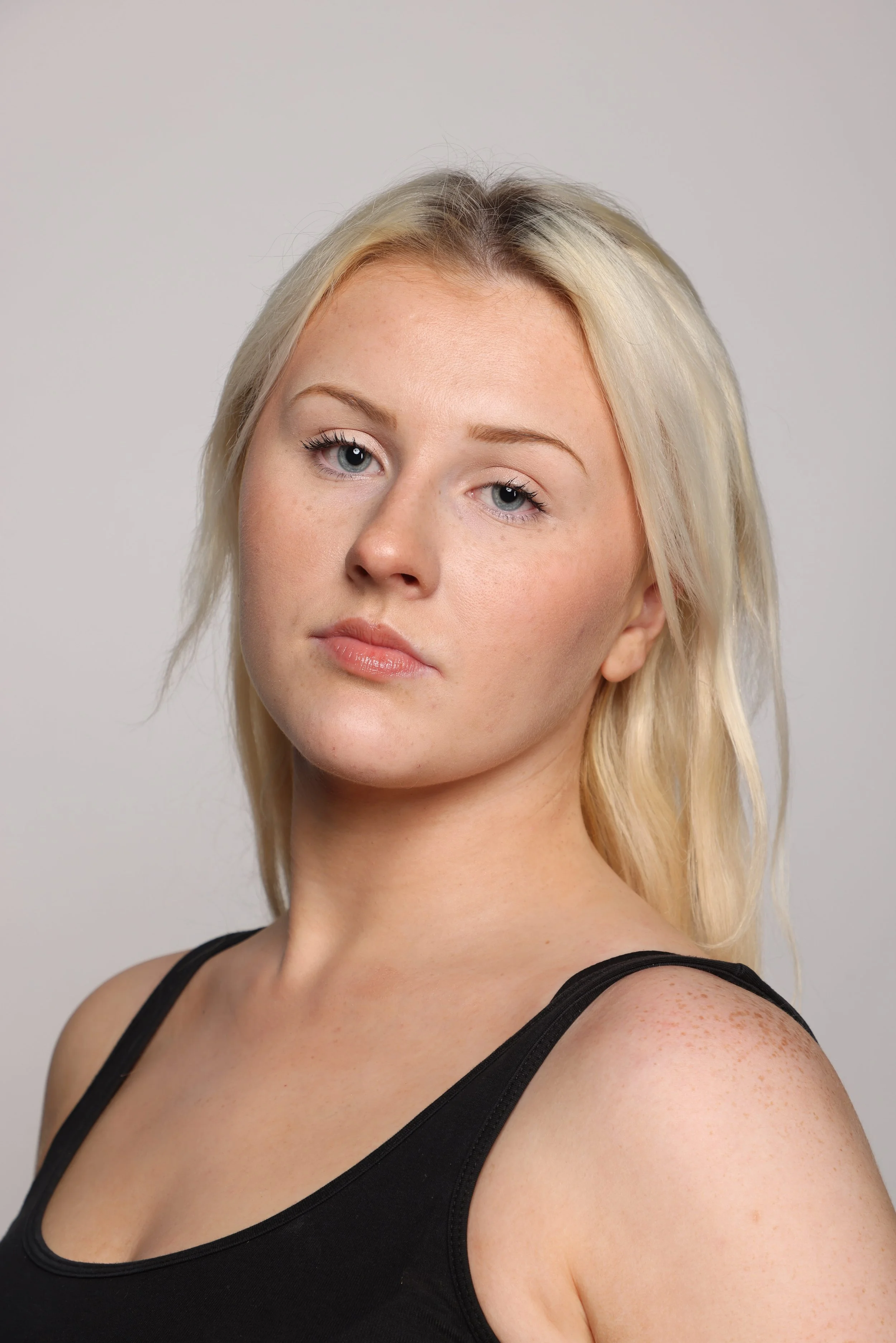 model in blonde hair black top (2).jpg