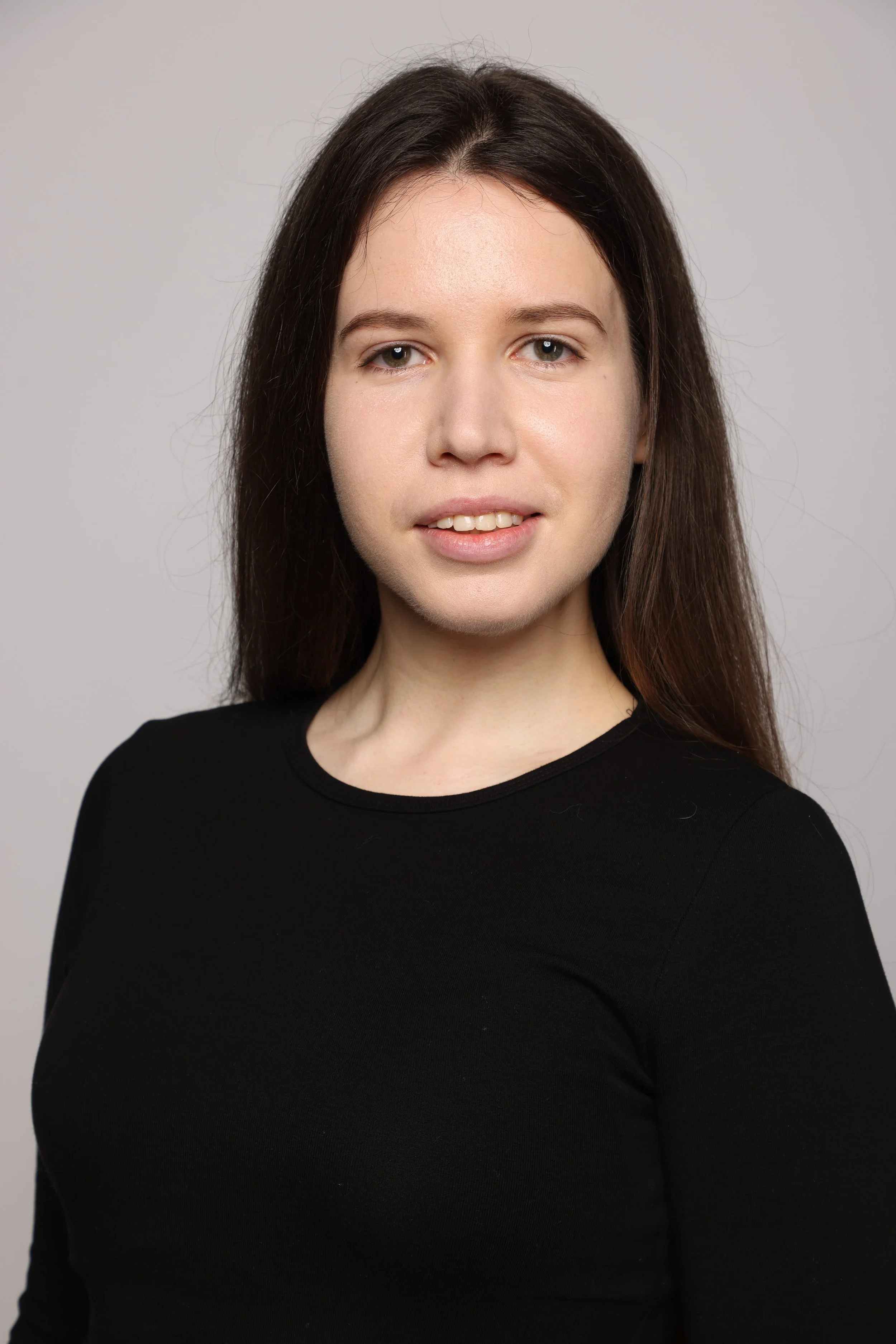 women in black top black hair at Model Eko Management (2).jpg