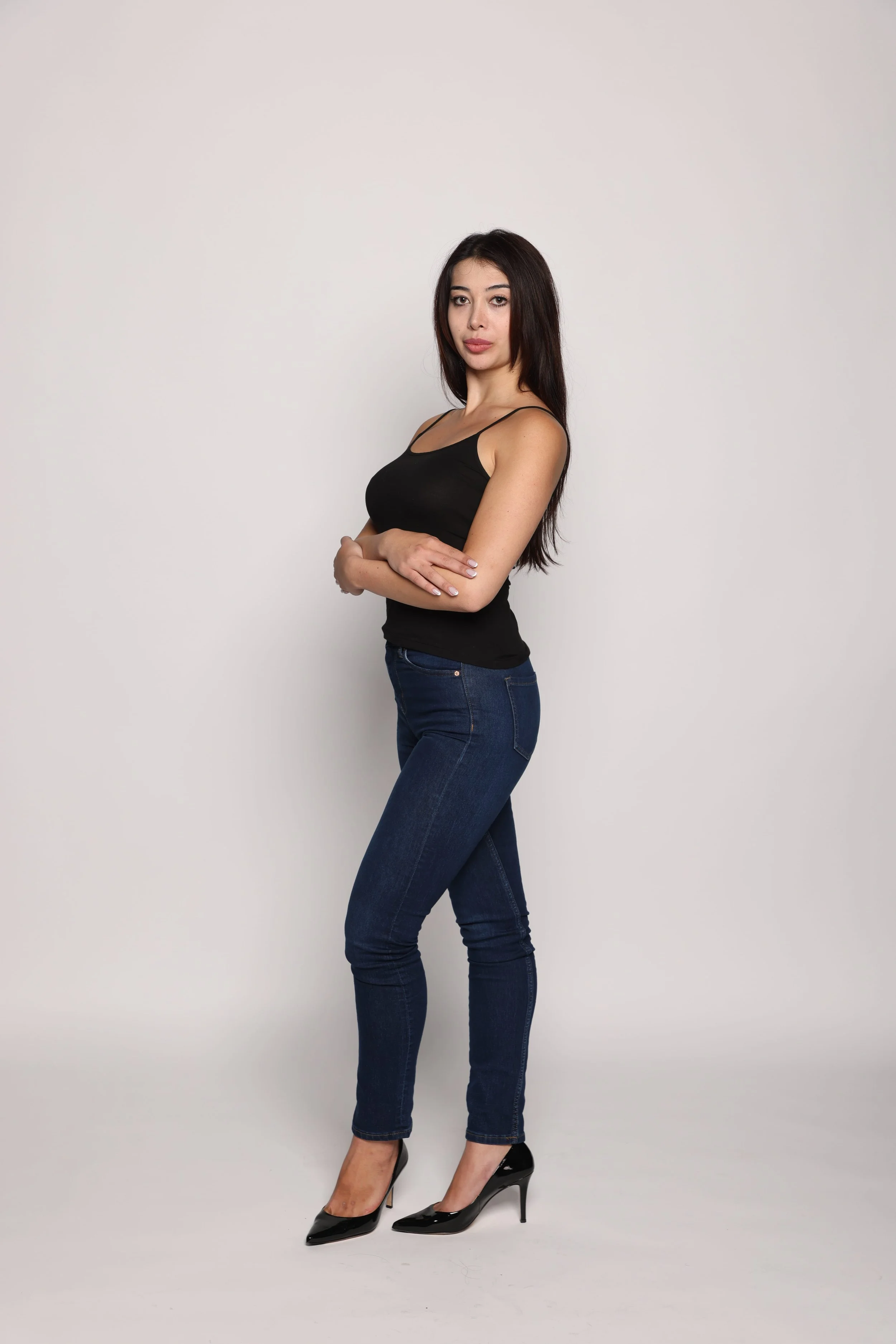 woman black tshirt black jean smiling2.jpg