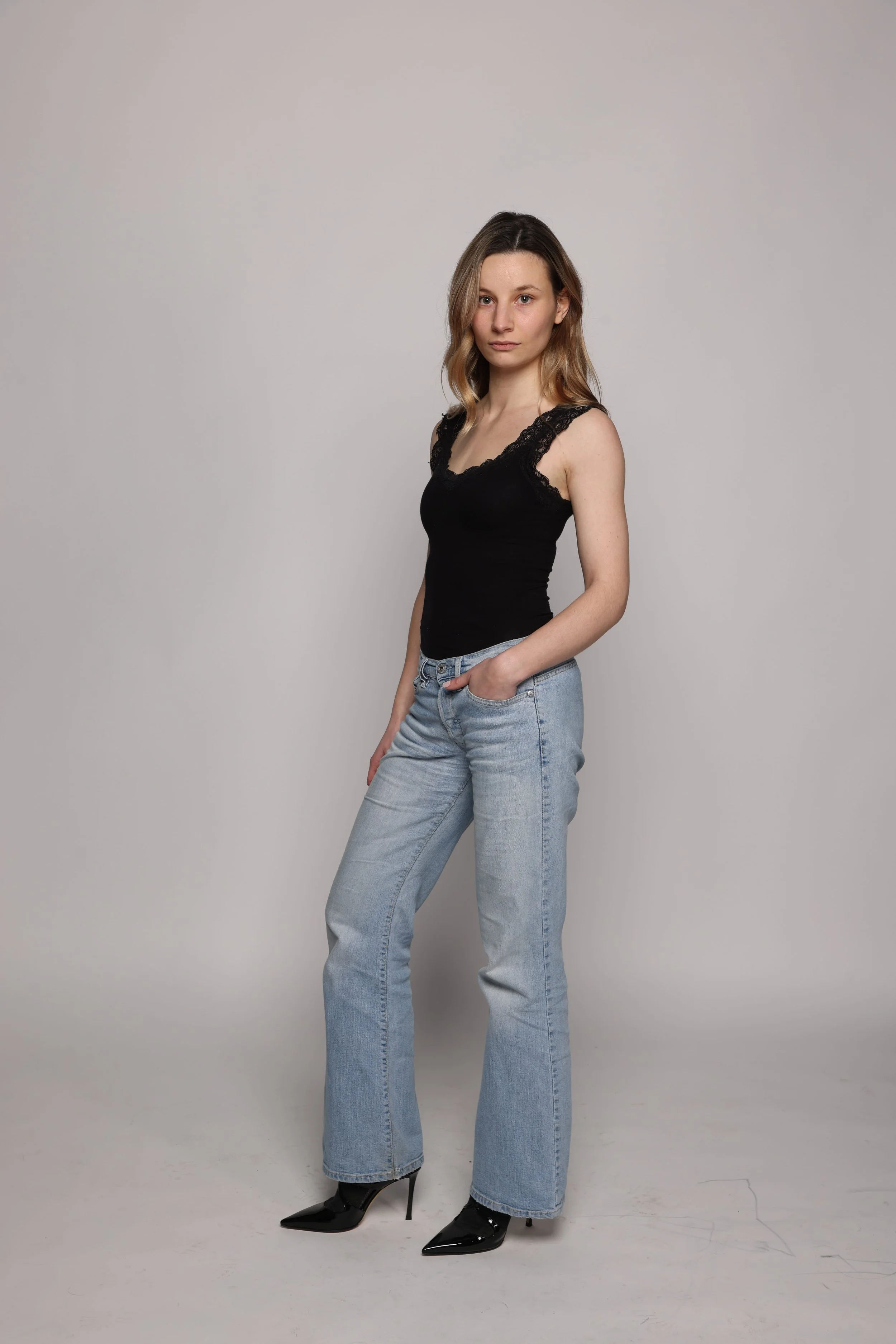 women in blonde hair black top (5).jpg