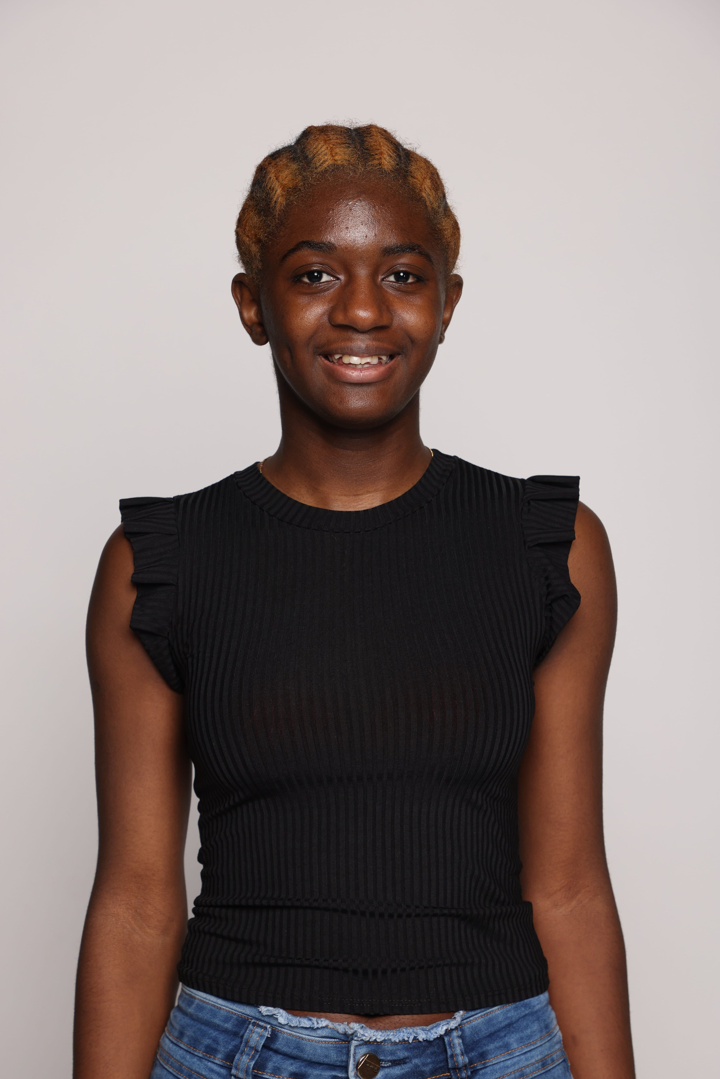 woman black tshirt blue jean smiling2.jpg