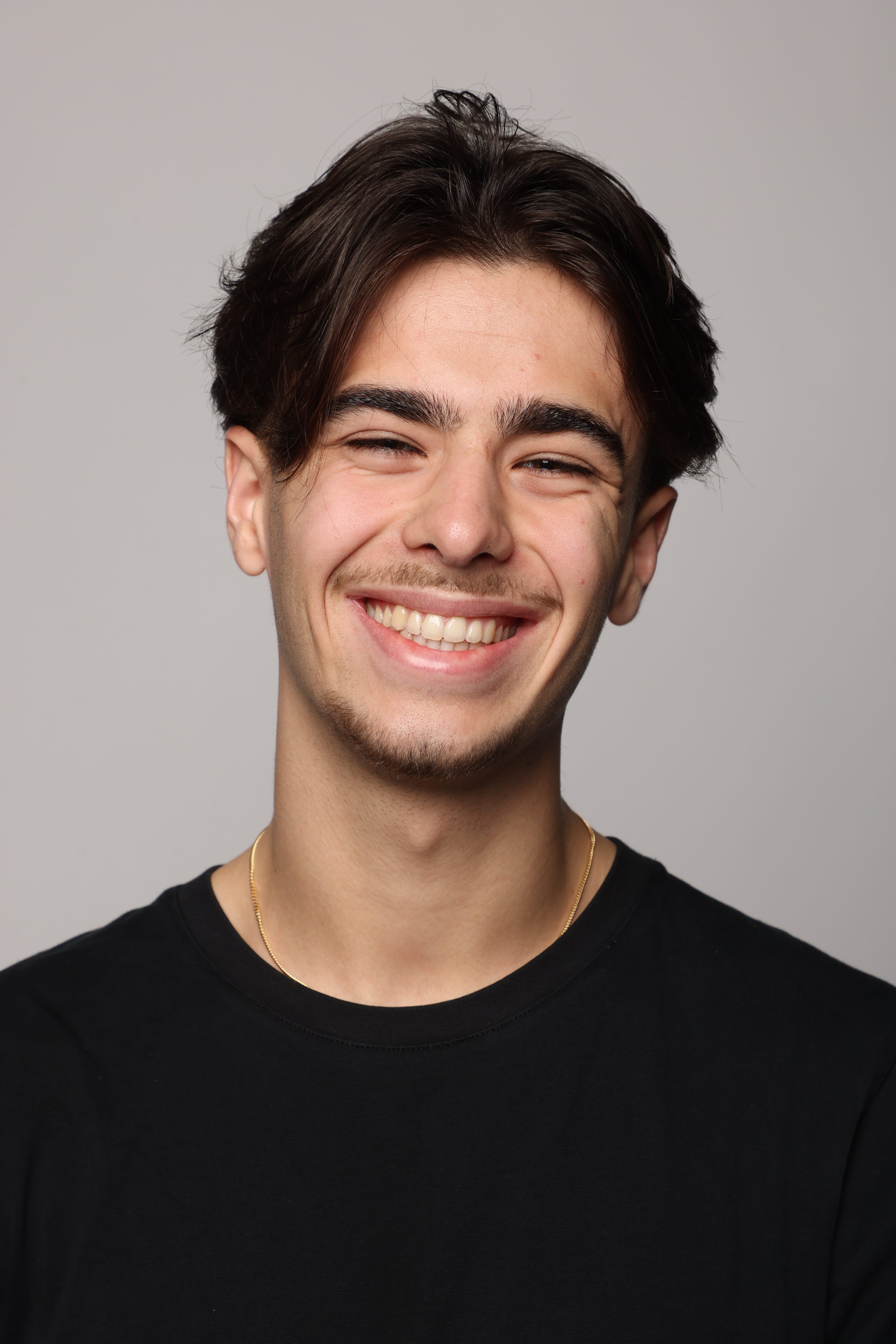 man black tshirt black jean smiling5.jpg