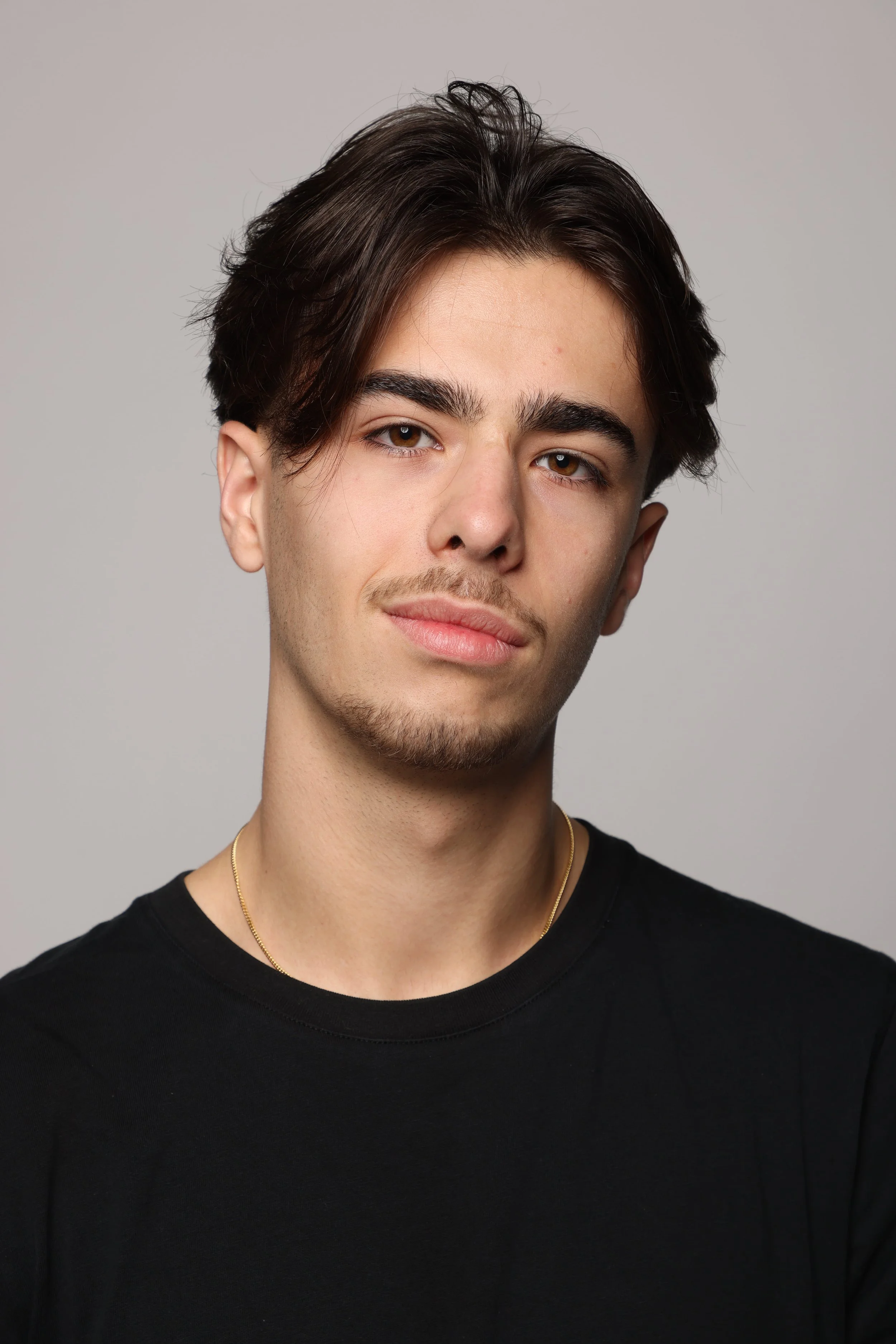 man black tshirt black jean smiling6.jpg