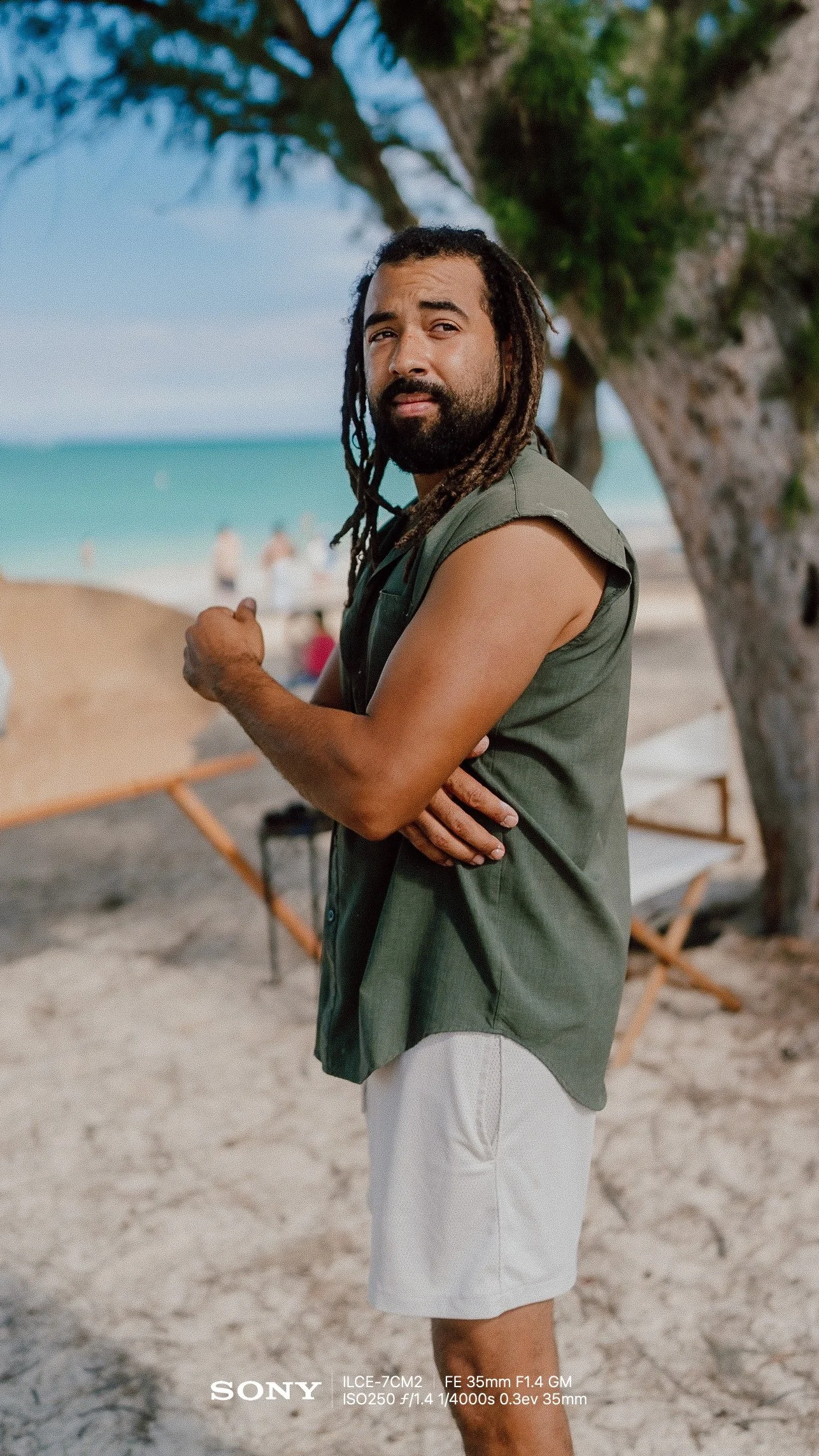  Relaxed Arms (V2)    “Stand tall and let your arms hang naturally by your sides. Laugh away from the camera as if a friend just told you a good joke.”  Men, Standing, 🌳 Nature 