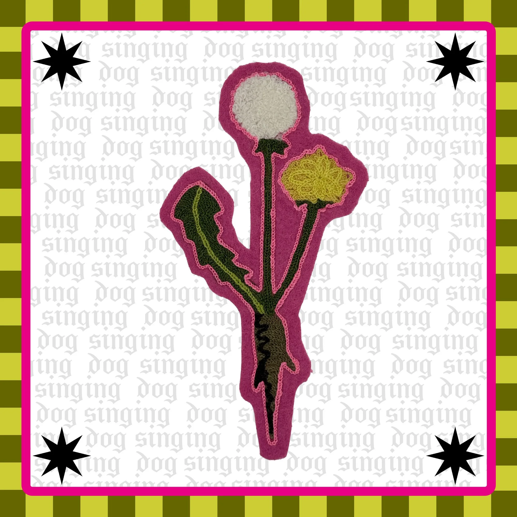 A colorful, embroidered design of a dandelion plant with one white and one yellow flower set against a white background with repeated gray text 'singing dog' and black star shapes. The design is bordered with a pink and green checkered pattern.