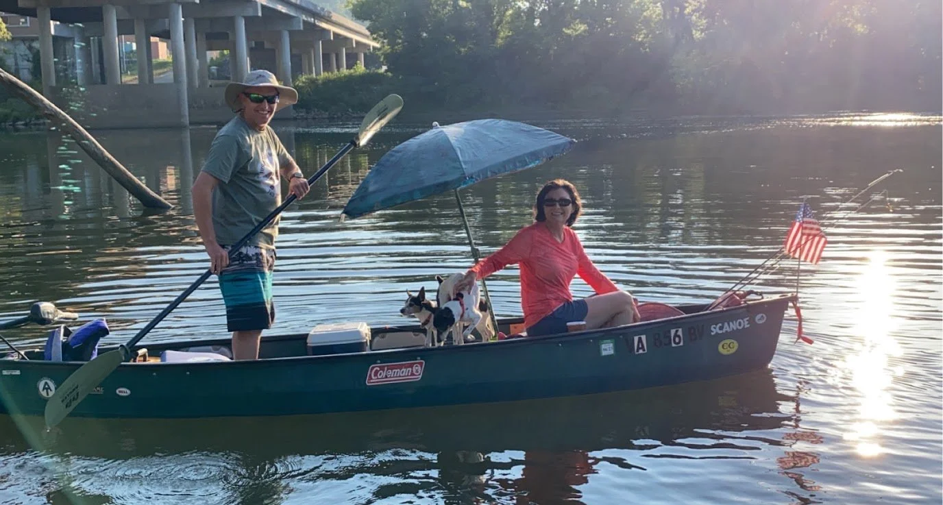 Chris enjoying time with his wife, Tonya, and dogs, Chief and Tonto