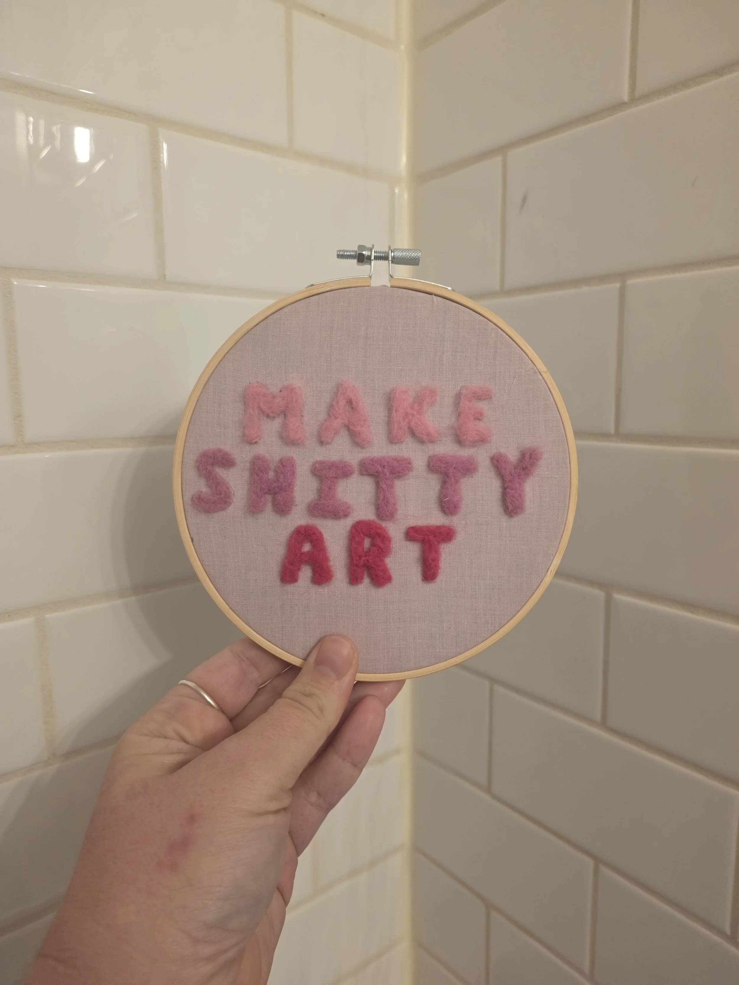 make shitty art - needle felted hoop art