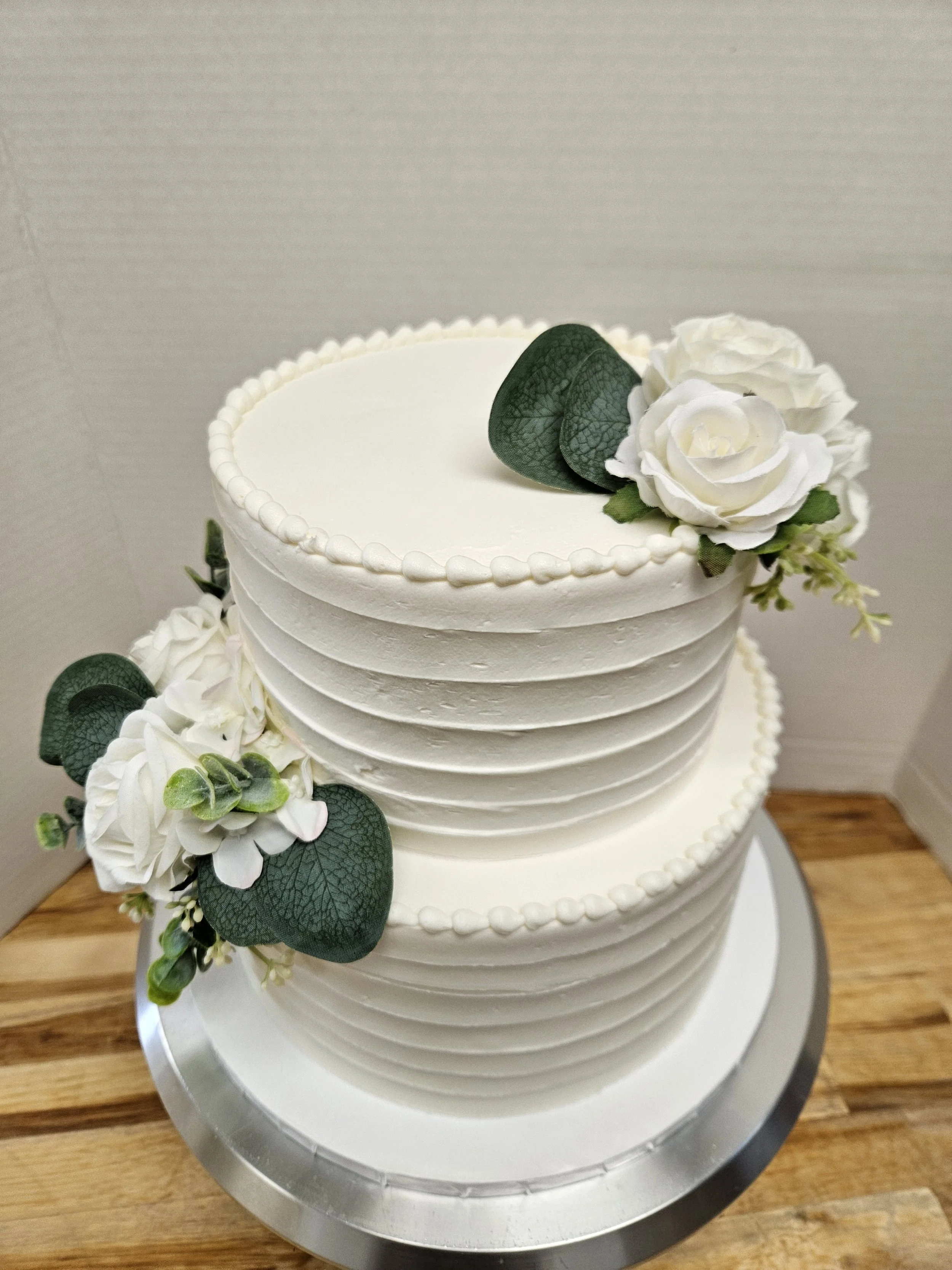 2 Tier Lined Sides White Flowers and Greenery (3).jpg