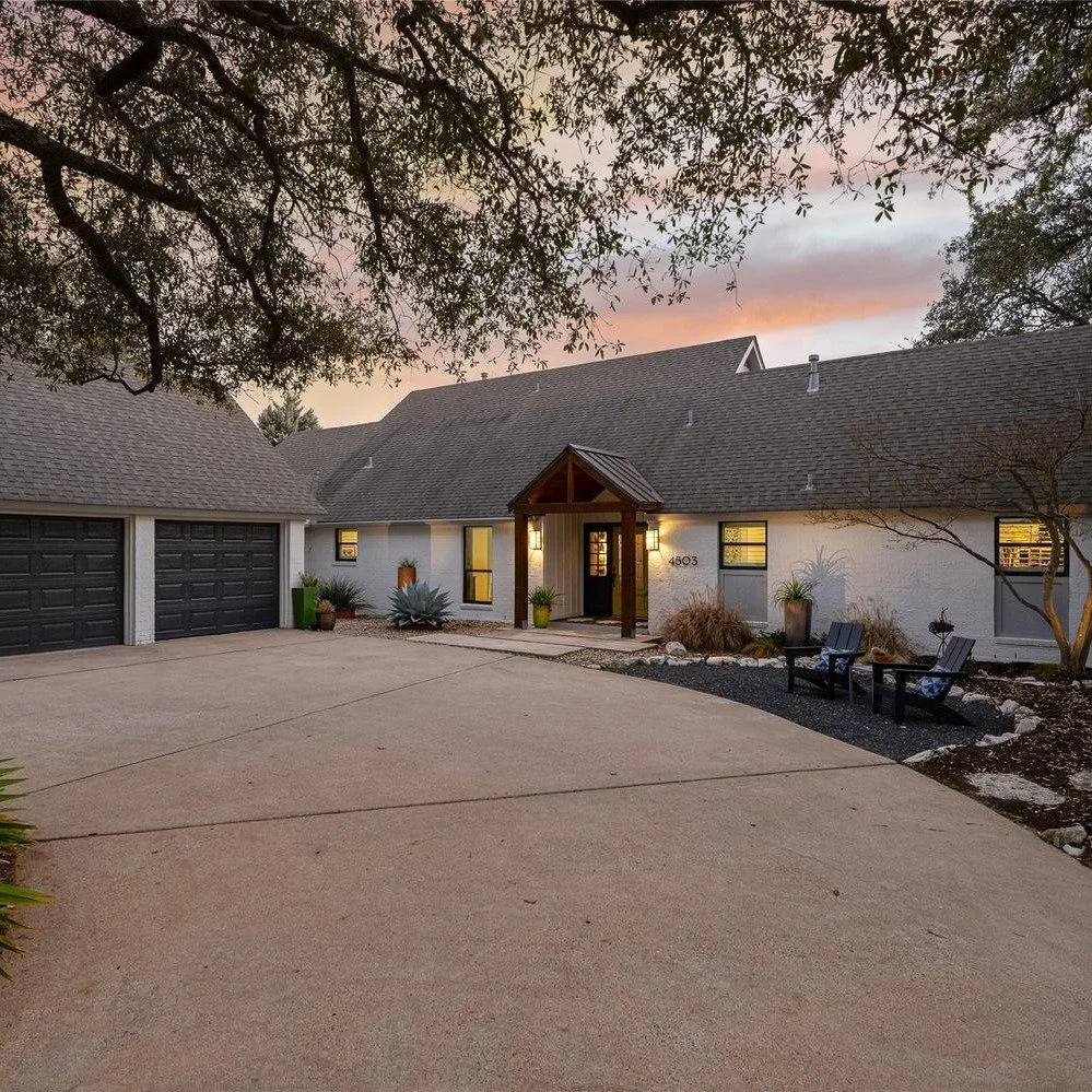 Would You Live Here?🏡💰 Tucked into a private, tree-filled setting in NW Austin, this unique home at 4503 Mountain Path Dr in Austin combines architectural character with thoughtful updates. From the light-filled living spaces to the pool and outdoo