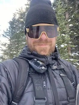 man in snowmobile gear during an AIARE companion rescue course in Colorado