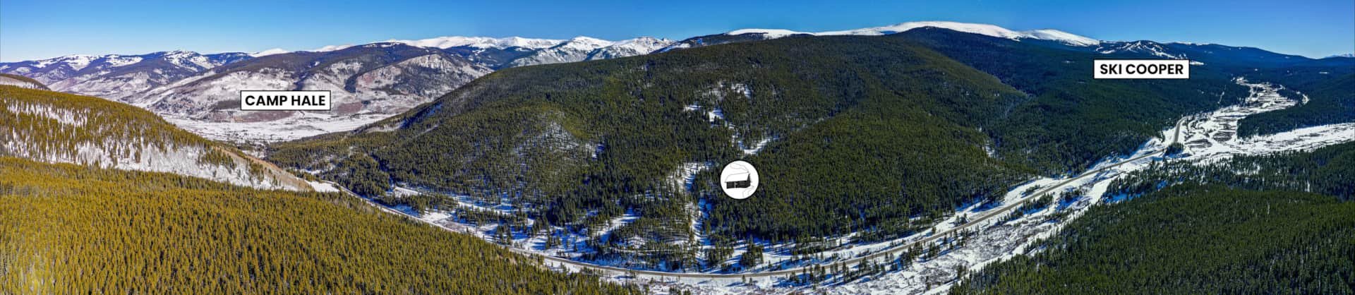 Panoramic view of snowy mountain landscape with labeled areas: Camp Hale, Ski Cooper, and a ski lift in between.