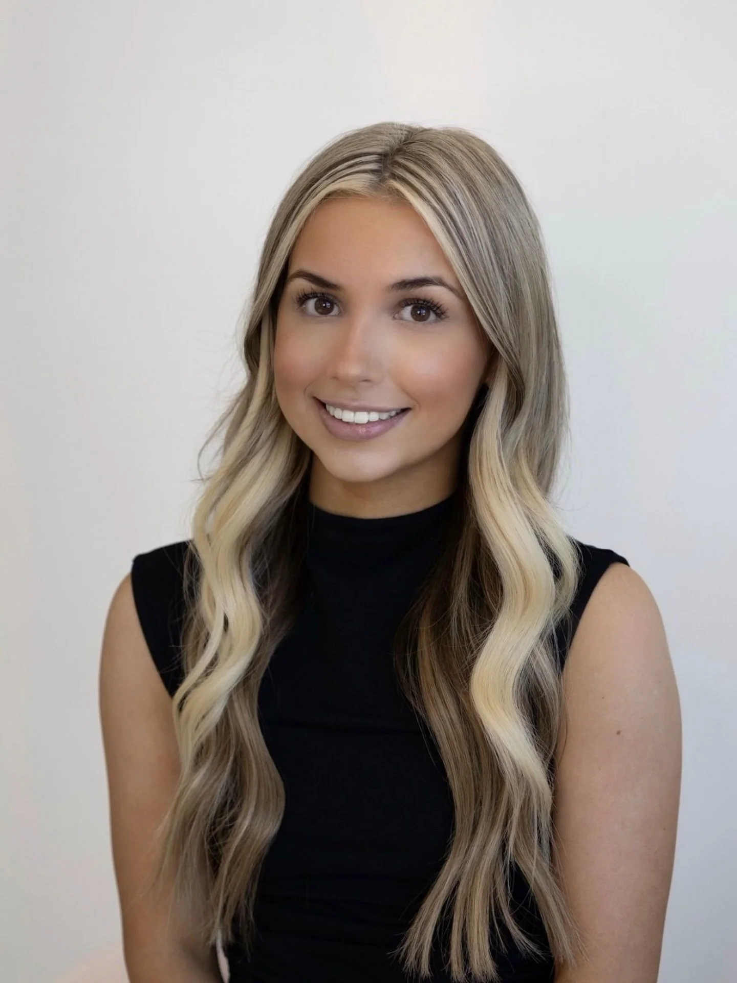 Meet Kylie! She is our dedicated client coordinator and lucky hair sparkler. She is always here to warmly welcome you, answer any questions, and guide you through scheduling your appointment.

She is a Licensed Esthetician who graduated from Spectrum