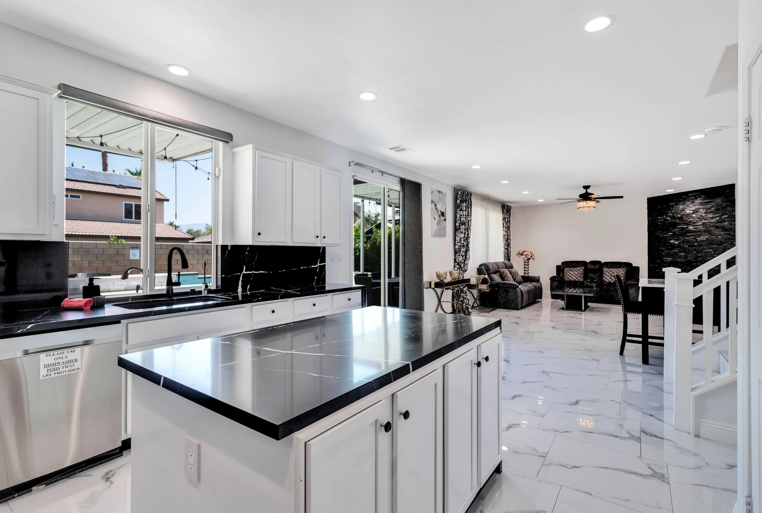 E3 - Kitchen island and open living area.jpg