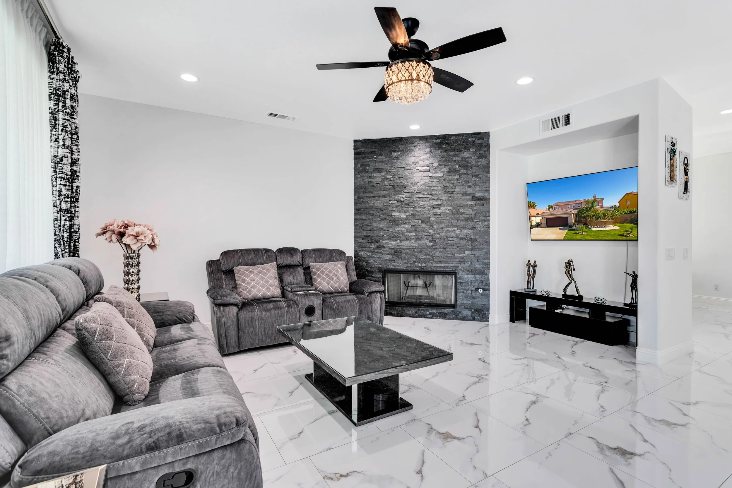 C2 - Living room fireplace and television.jpg