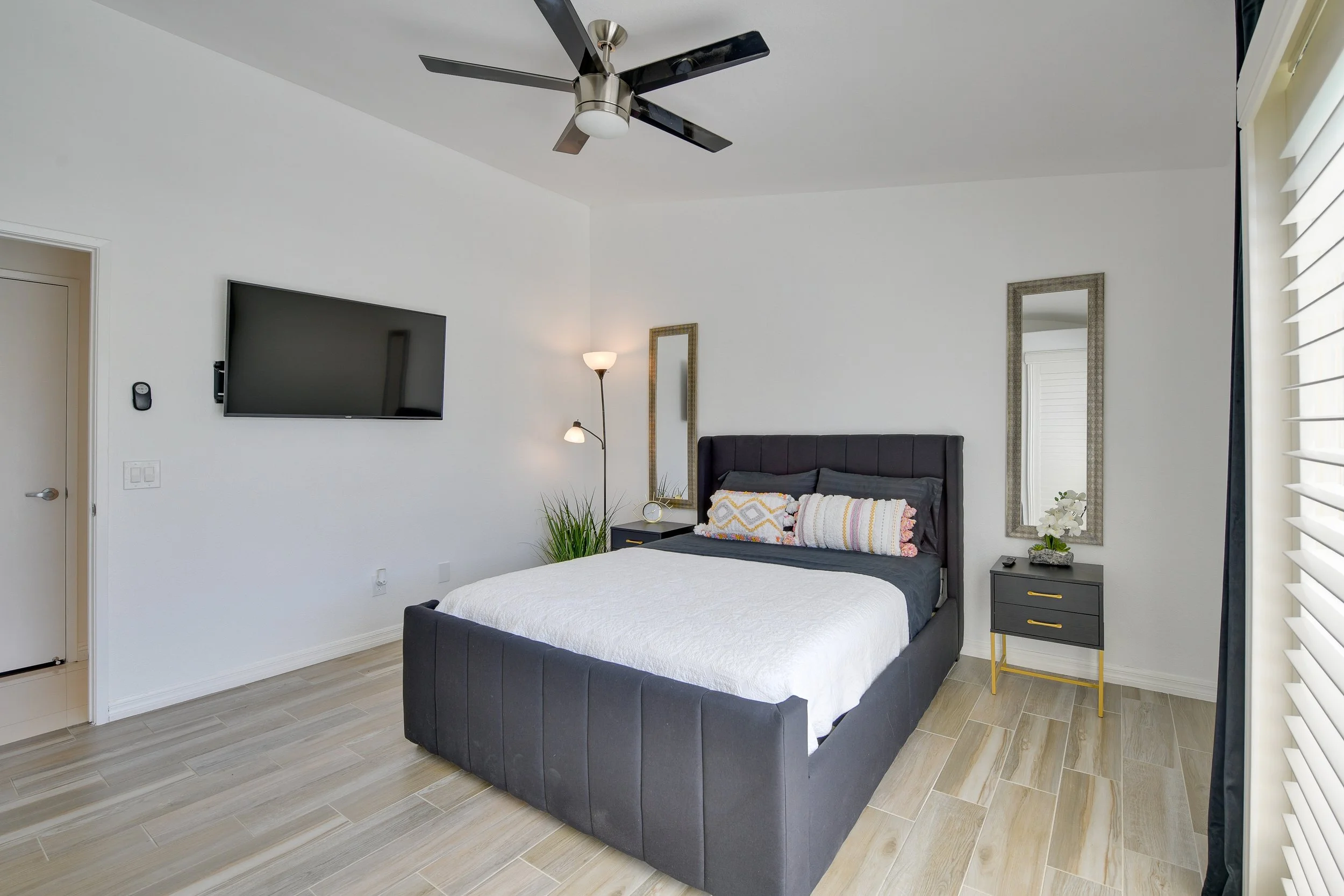 A5-Primary Bedroom with King Bed & TV.jpg