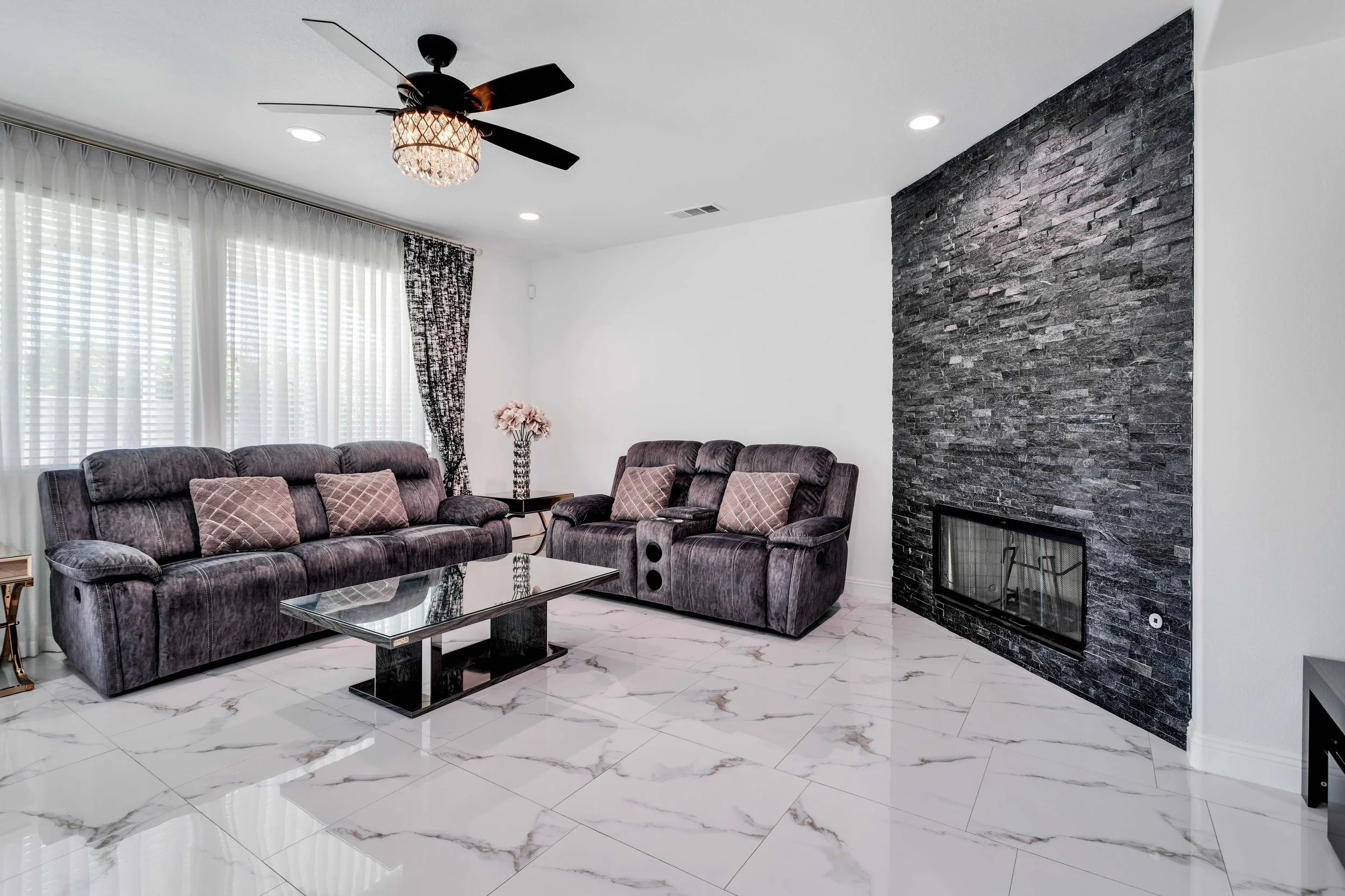 C1 - Living room seating and fireplace.jpg
