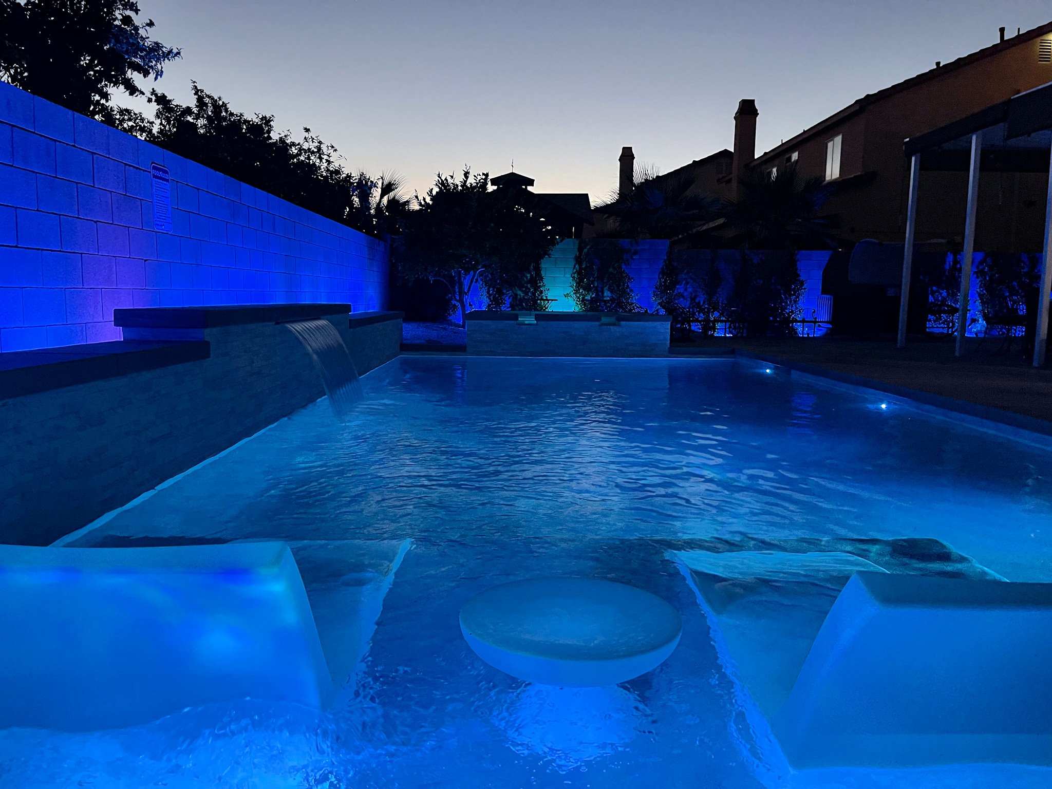 B18 - In-water pool loungers at night.jpg