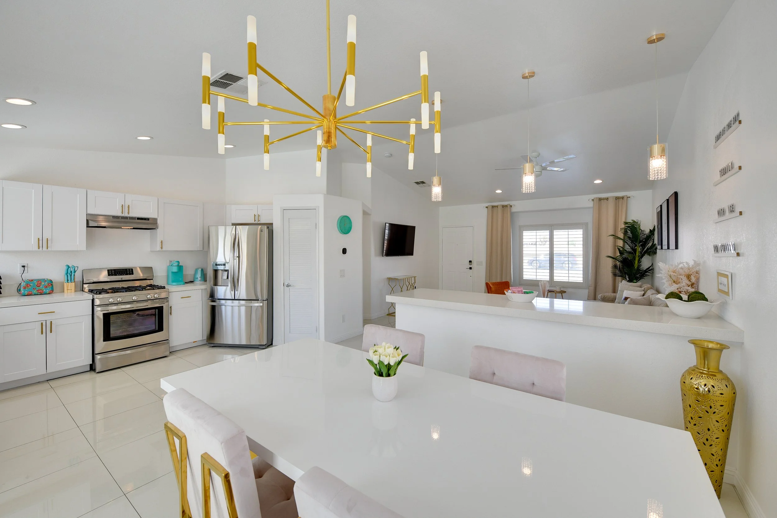 A3-Bright Open Kitchen with Island & Dining.jpg