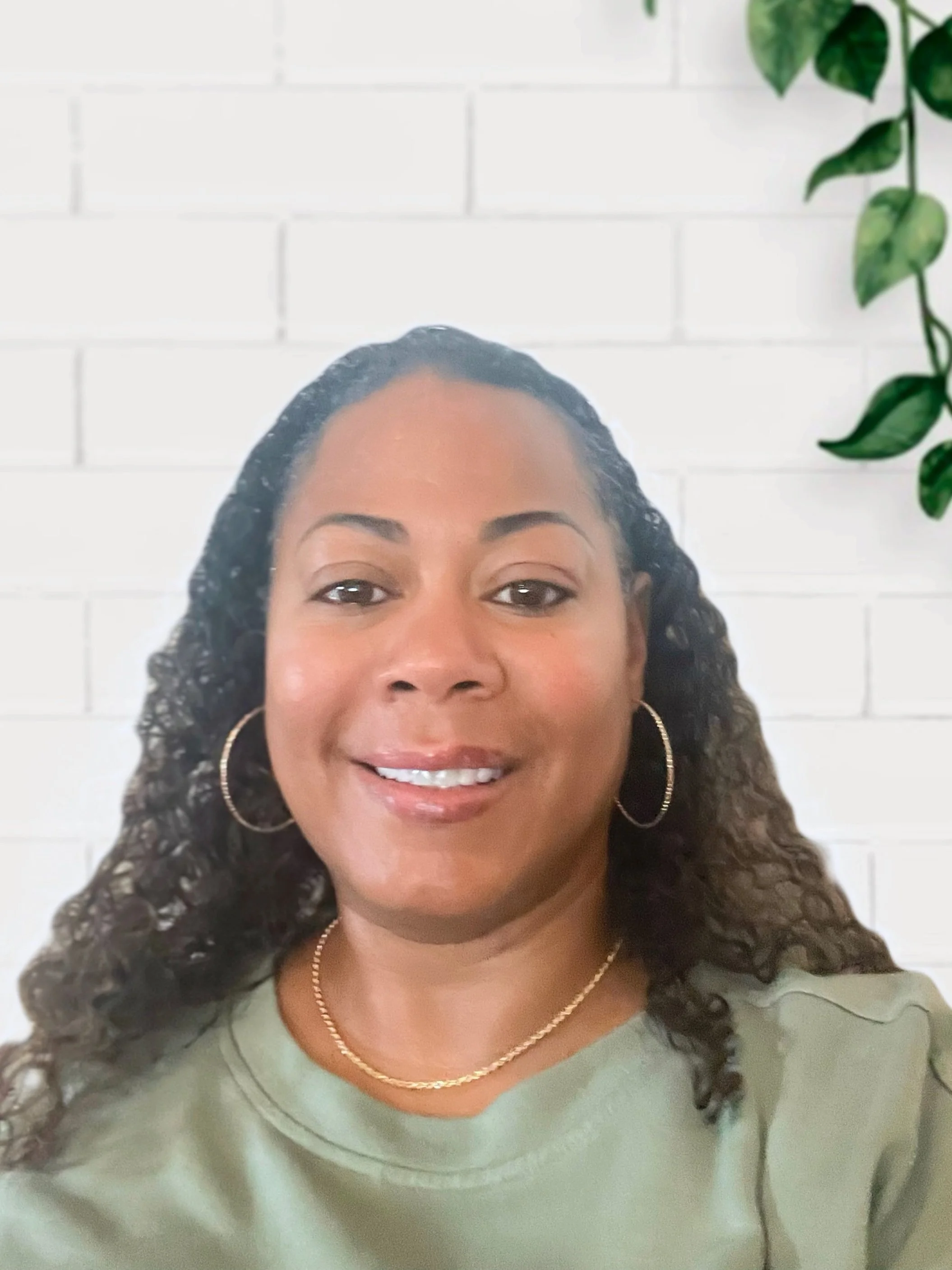 Candice Pellicori, LCSW, licensed clinical social worker at Peace in Counseling in Naperville, Illinois, headshot with a welcoming expression.