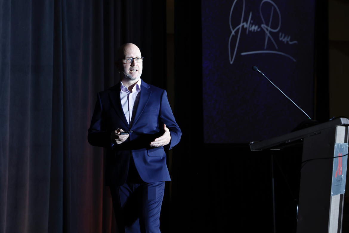 Julian Reeve presenting a keynote