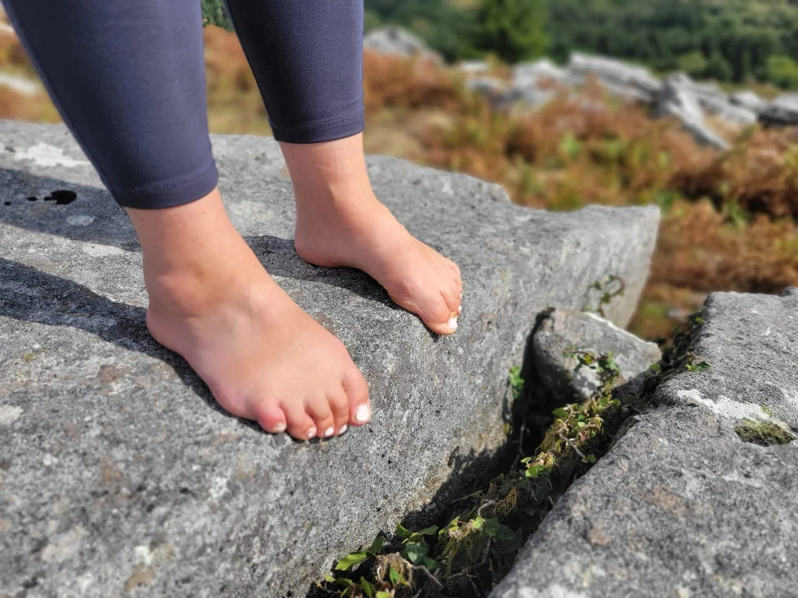 bare feet grounding on Dartmoor tor