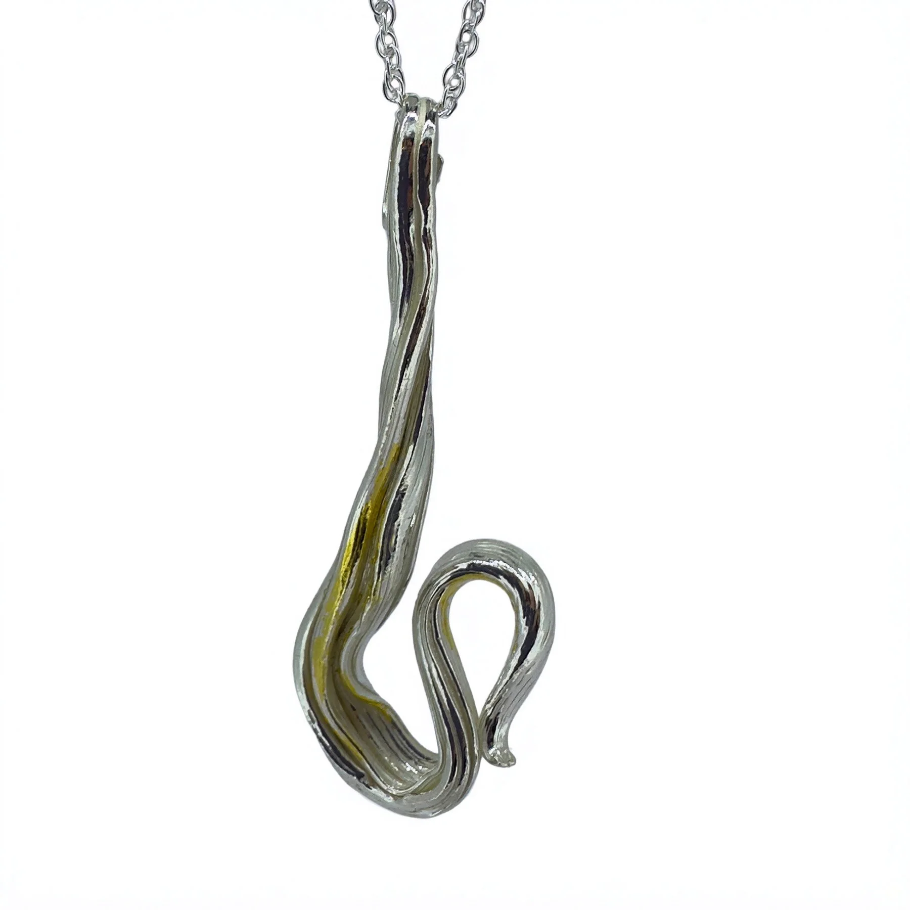 Twisted and striated looped silver pendant | addition of keum-boo gold accents | using mitsuro hikime wax