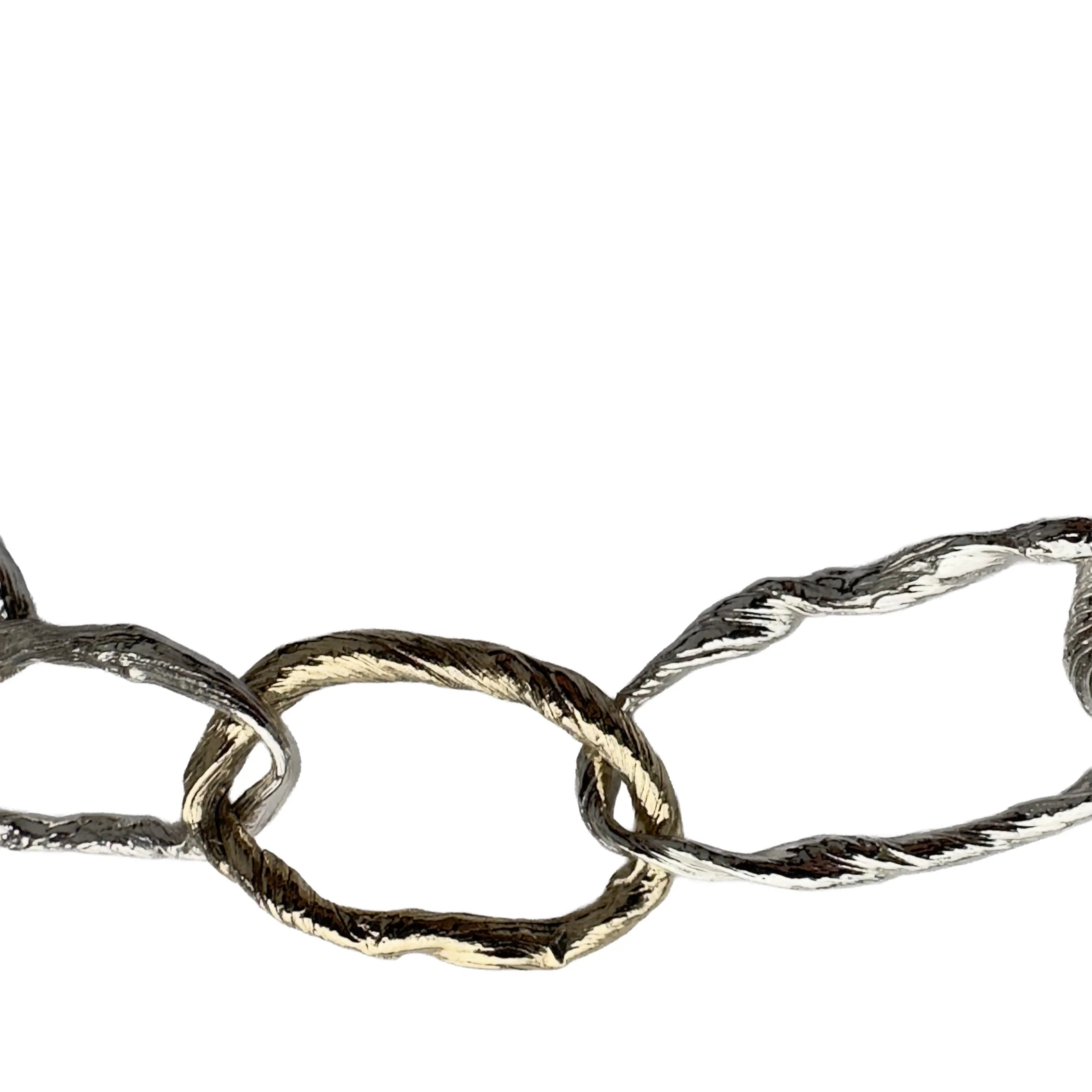 Silver and 9ct gold link striated necklace | one 9ct gold link to add accent to the necklace |  using mitsuro hikime wax