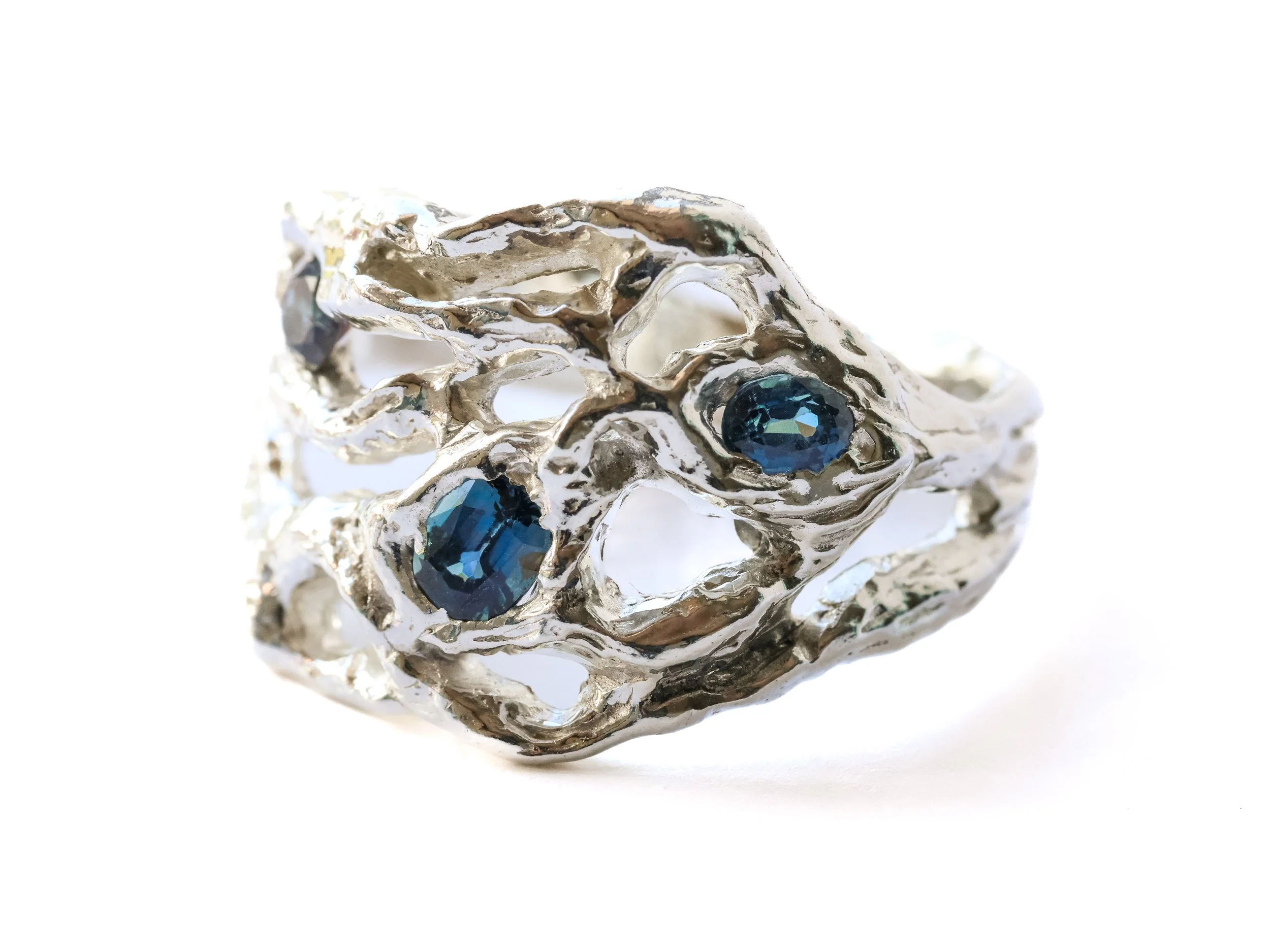 Eroded form II ring | Silver and blue faceted ring inspired by eroded rock formations