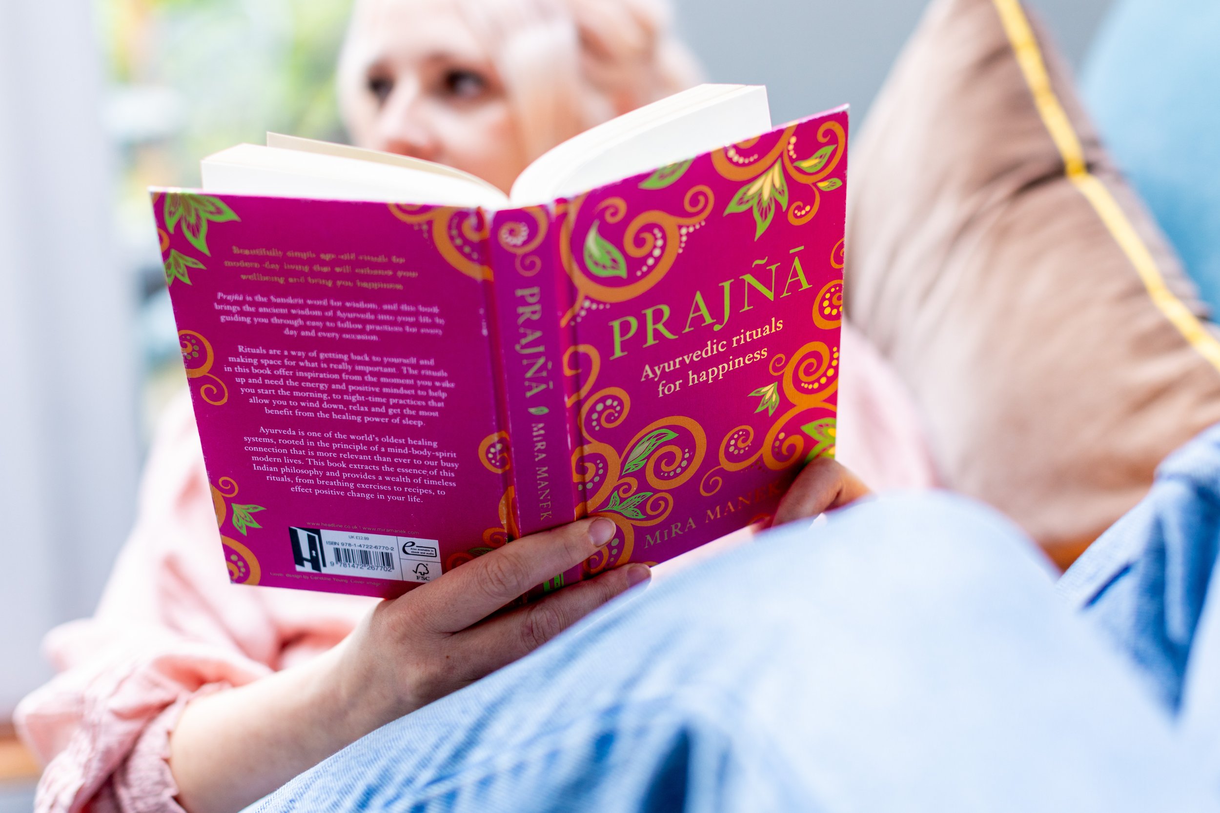 Ruth is reading a book of the reading list for her Yoga Teacher Training in the Uk