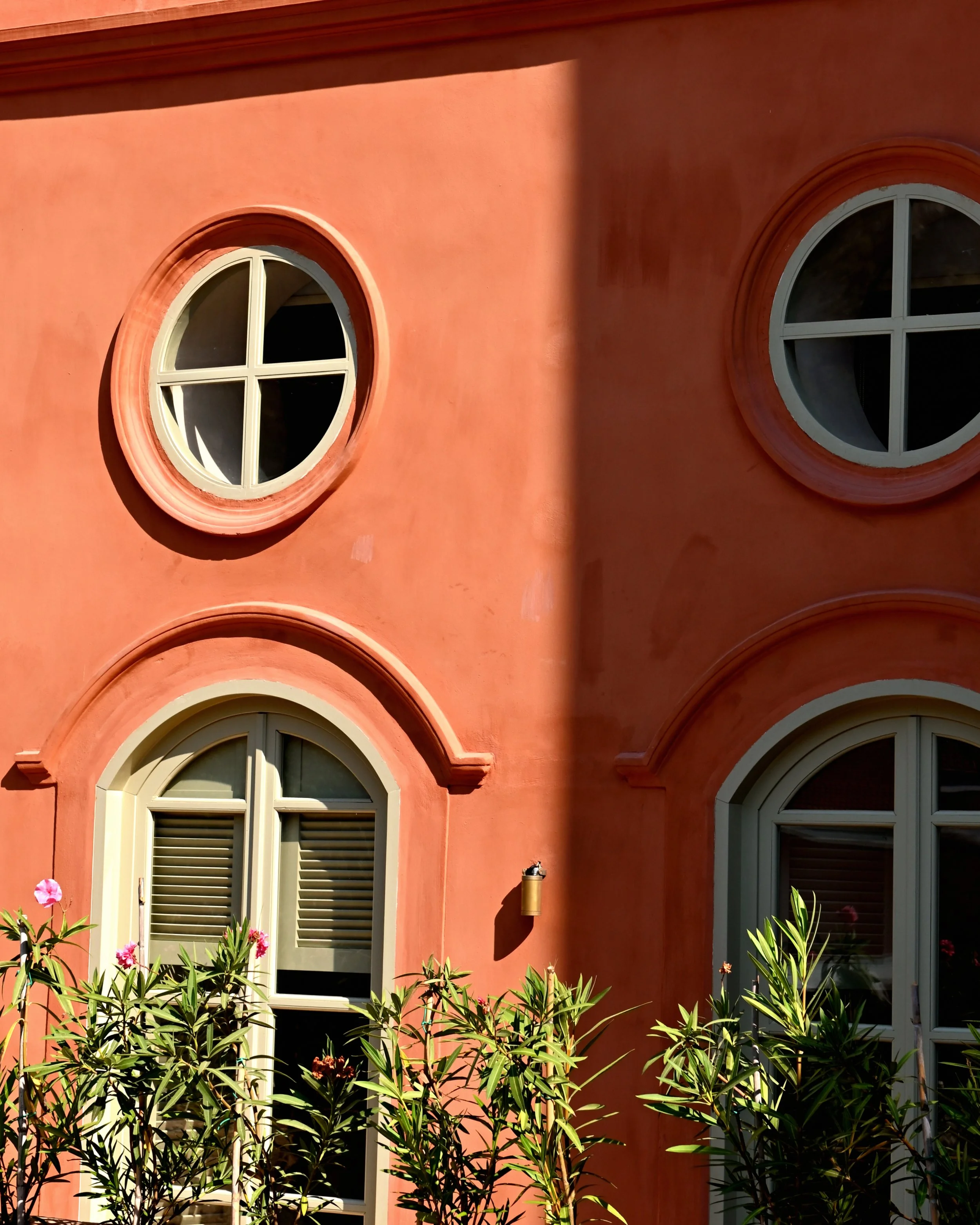 Explore our Villas at Casa Mediterraneo Hotel in Kastelorizo, Megisti, where our façades are adorned with local limestone and natural pigments from Rhodes, showcasing eco-friendliness. Lush green plants complete the picture, creating a harmonious and