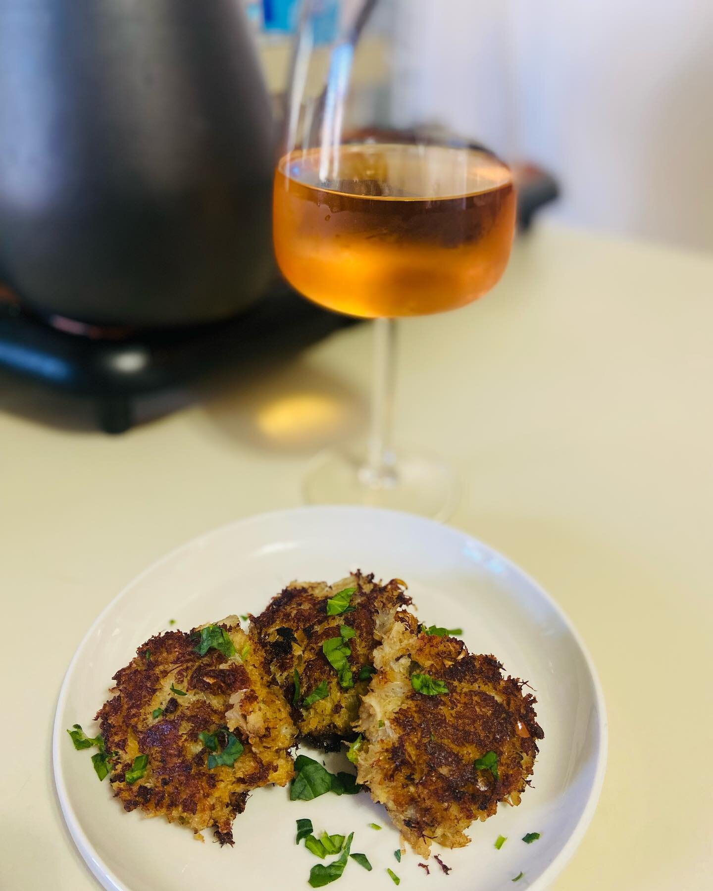 Orange wine and Crab Cakes 
What a lovely pairing and a great way to celebrate your day.

Orange wine also called macerated or skin contact wine, made with white grapes using the same process used to make red wine. The grapes are left to macerate wit