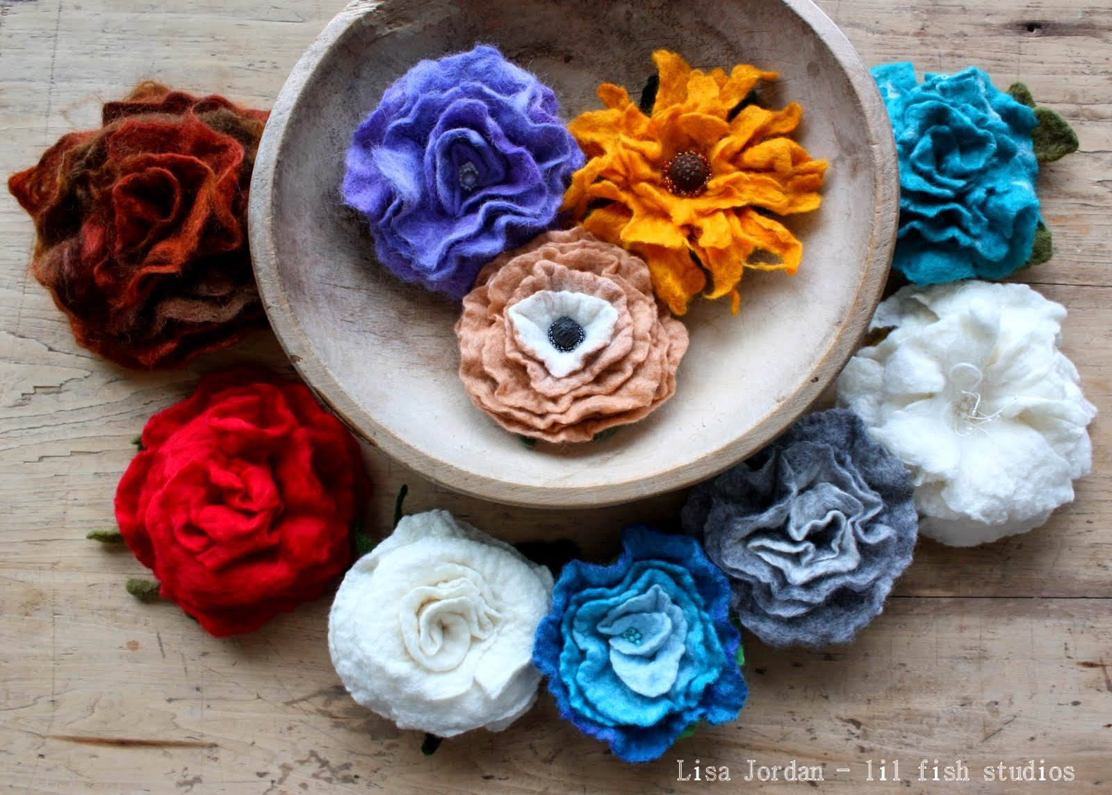 wet felted flower brooches.JPG