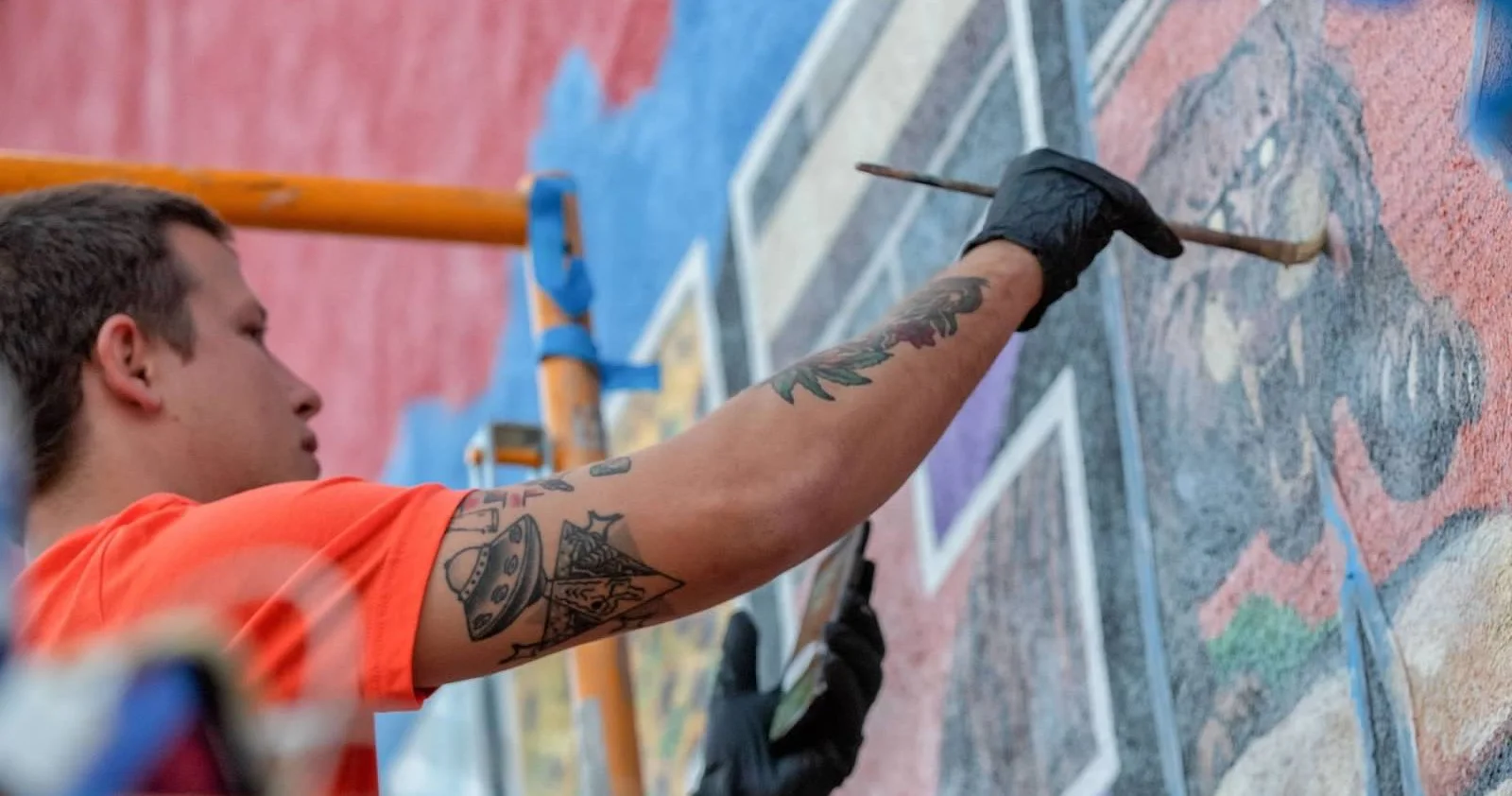 Man Painting Mural Art
