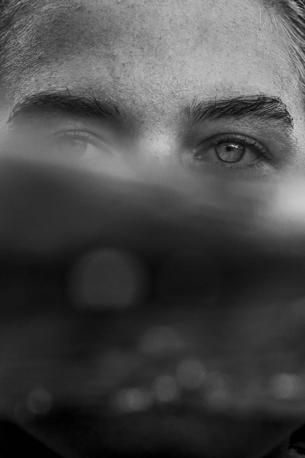 Close black and white portrait of a woman shot in the water.
