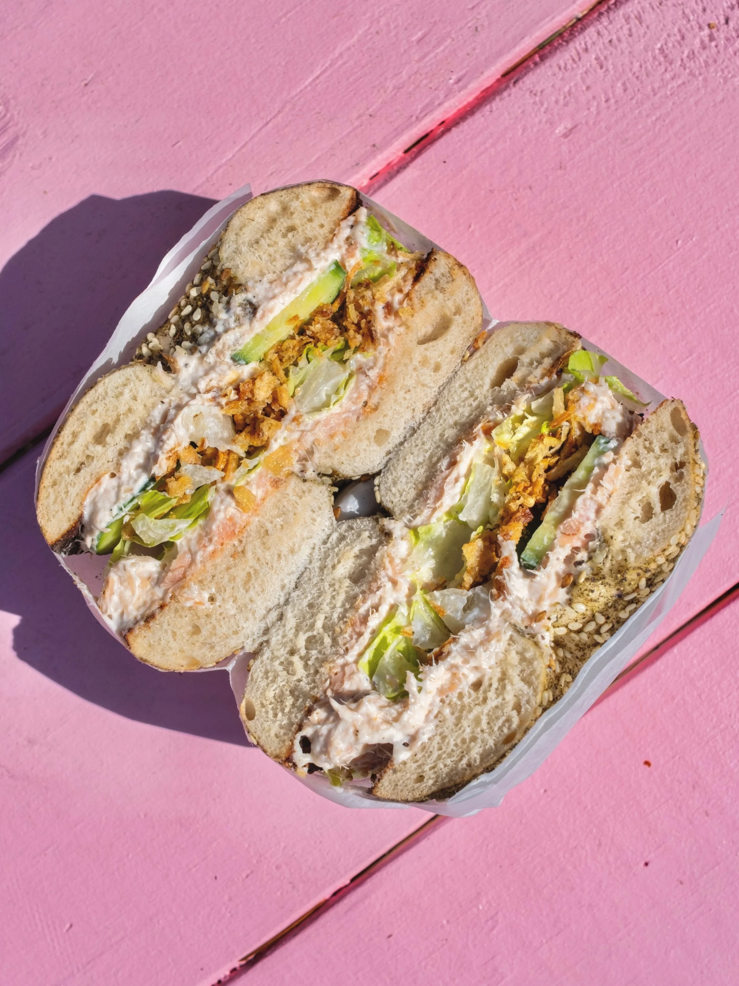 🦅THE GLENEAGLE🦅 one the menu since day 1: candied salmon cream cheese 🐟 + cri$py onions ❤️&zwj;🔥 + 🥒 + 🥬 on a @zandzdc za'atar bagel 🧨🎇