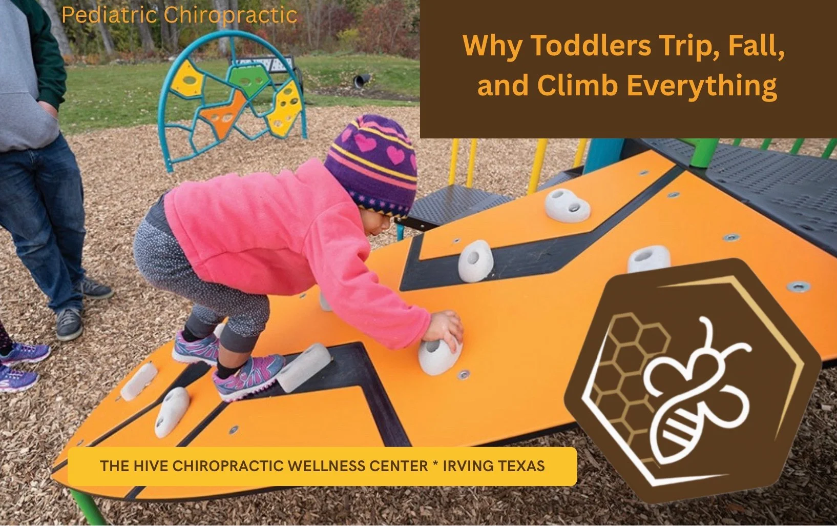 Toddler climbing playground equipment confidently