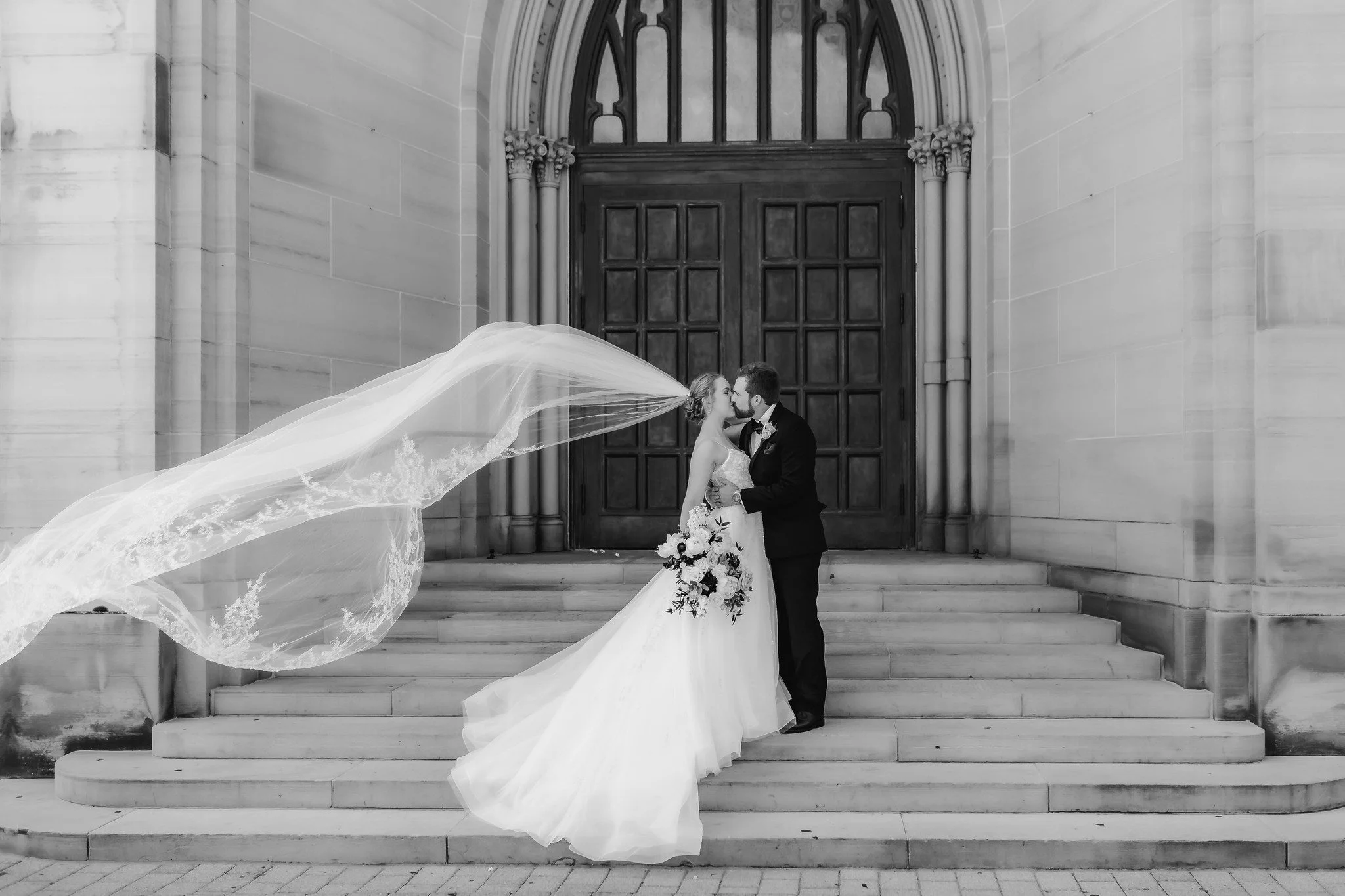 Our sweet Emily and Andrew on the steps of the beautiful St. Andrews Cathedral in Grand Rapids, Michigan.  Such a gorgeous photo. 

Natalie DeVries 📸

 #michiganweddingcoordinator #michiganweddingplanner #weddingday #michiganweddingplanning #rsvpeve