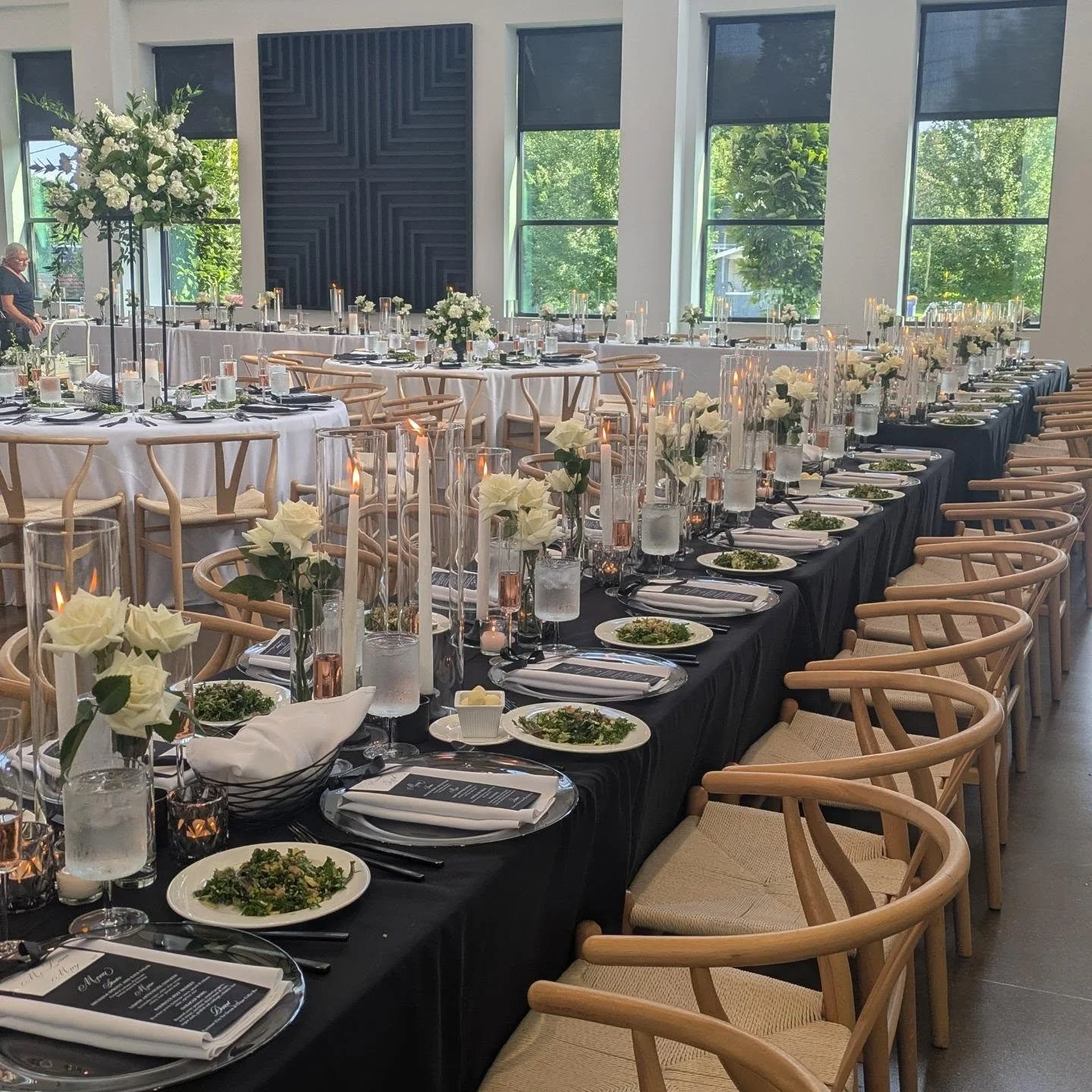 Paige and Tyler&rsquo;s September wedding was such a beautiful day, and this design was one of our favorites. From the black linens and candlelight to the stunning white florals, every detail came together to create a space that felt both elegant and