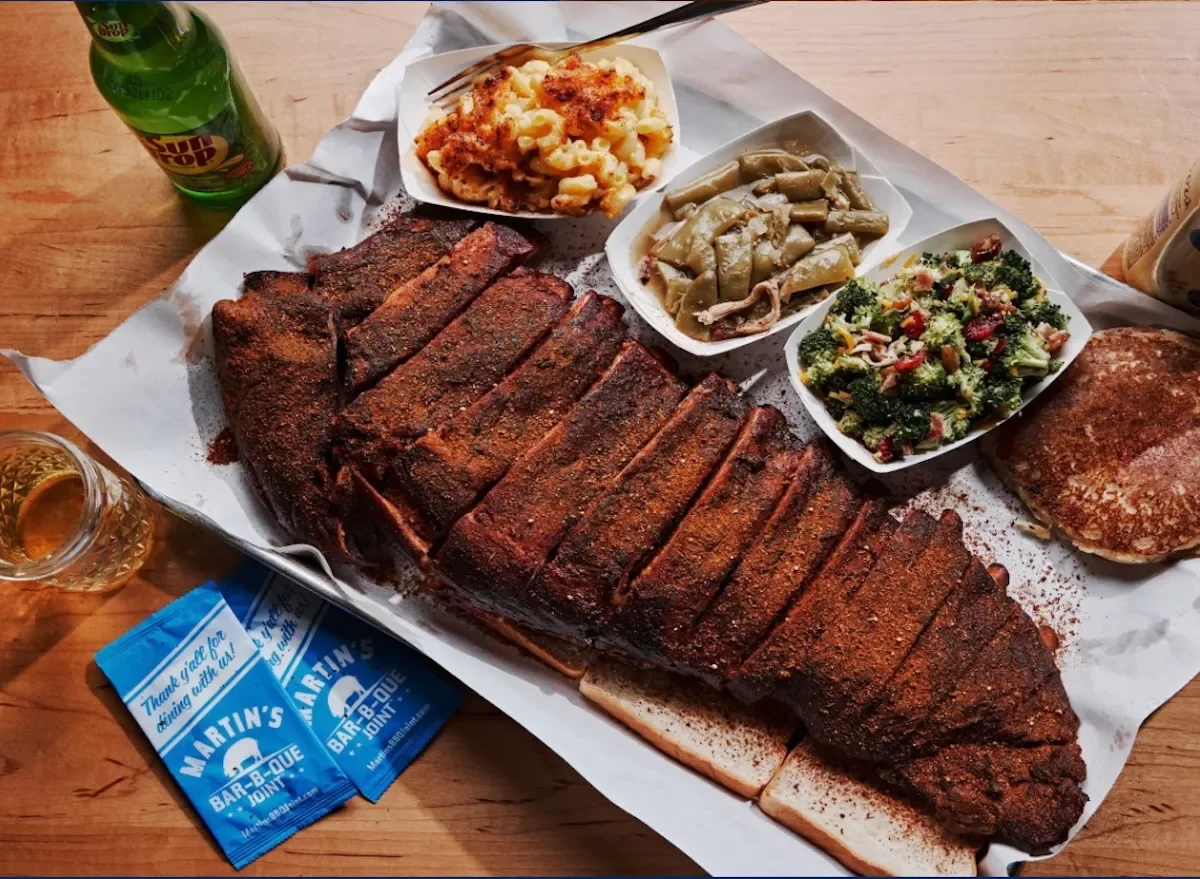 Overhead view of Martin's brisket with small trays of sides
