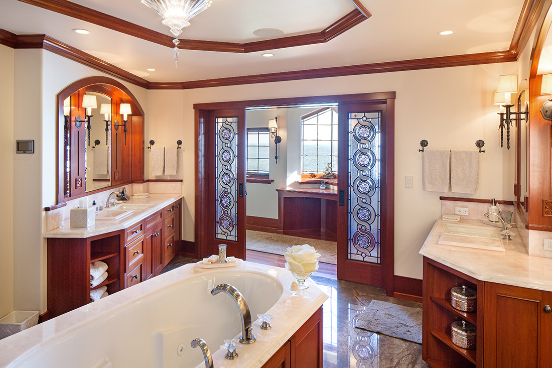  The master bath includes 2 pair of in-ceiling speakers, with waterproof speakers installed in the shower and water closet. An AMX 5” touch panel allows control over the entire bath, the master suite, or the entire property. 