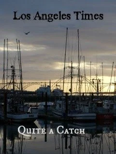 Graphic with a photo of a harbor at dawn and the text Quite A Catch and Los Angeles Times.