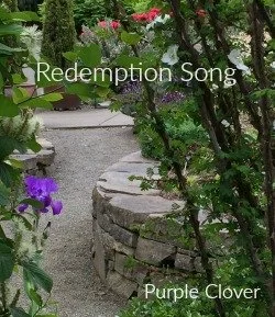 Image of an outdoor garden with purple and pink flowers with the text Redemption Song and Purple Clover.