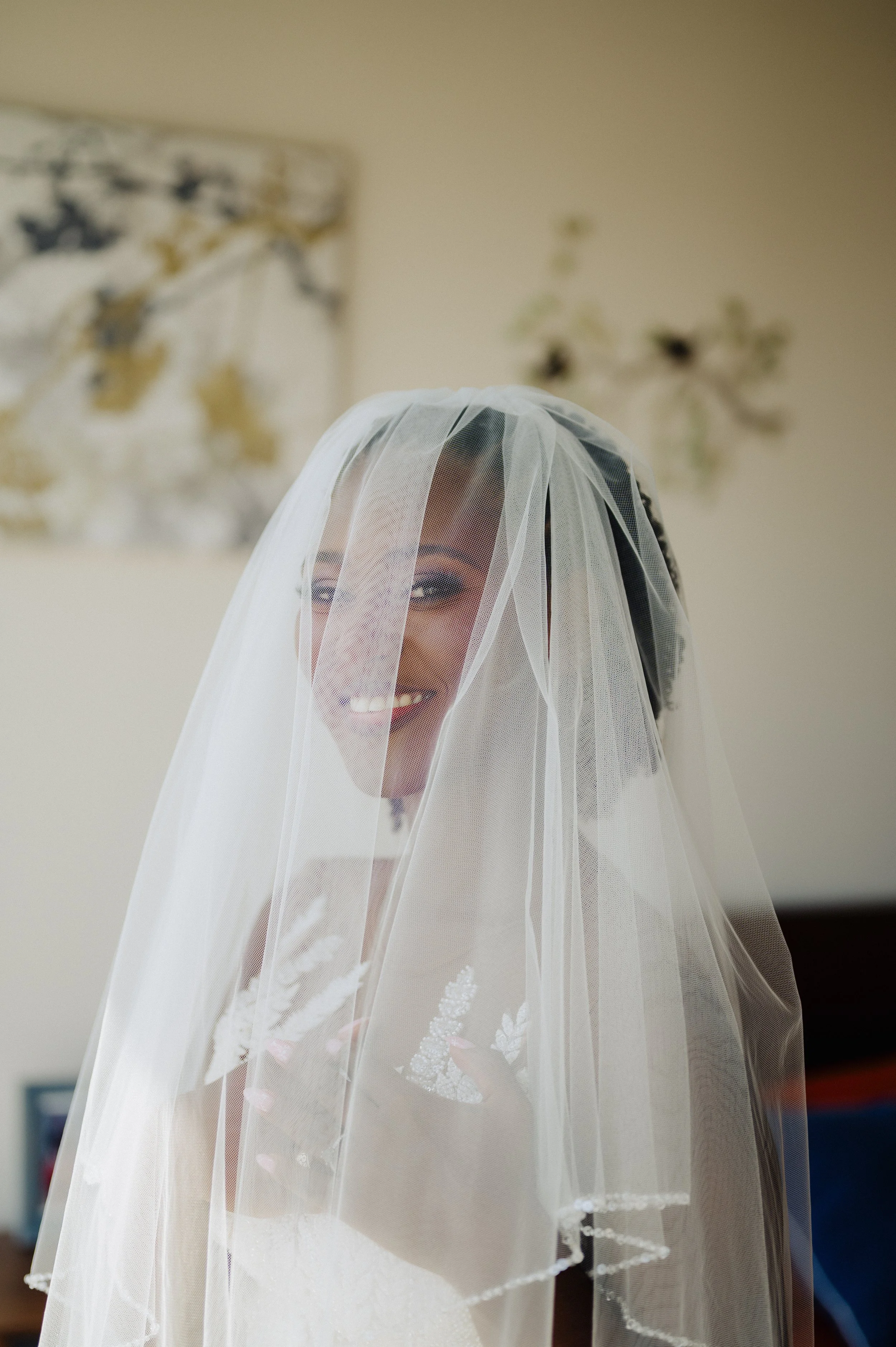 Elegant bridal portrait soft glam bridal makeup on brown bride at Tampa Bay riverside venue