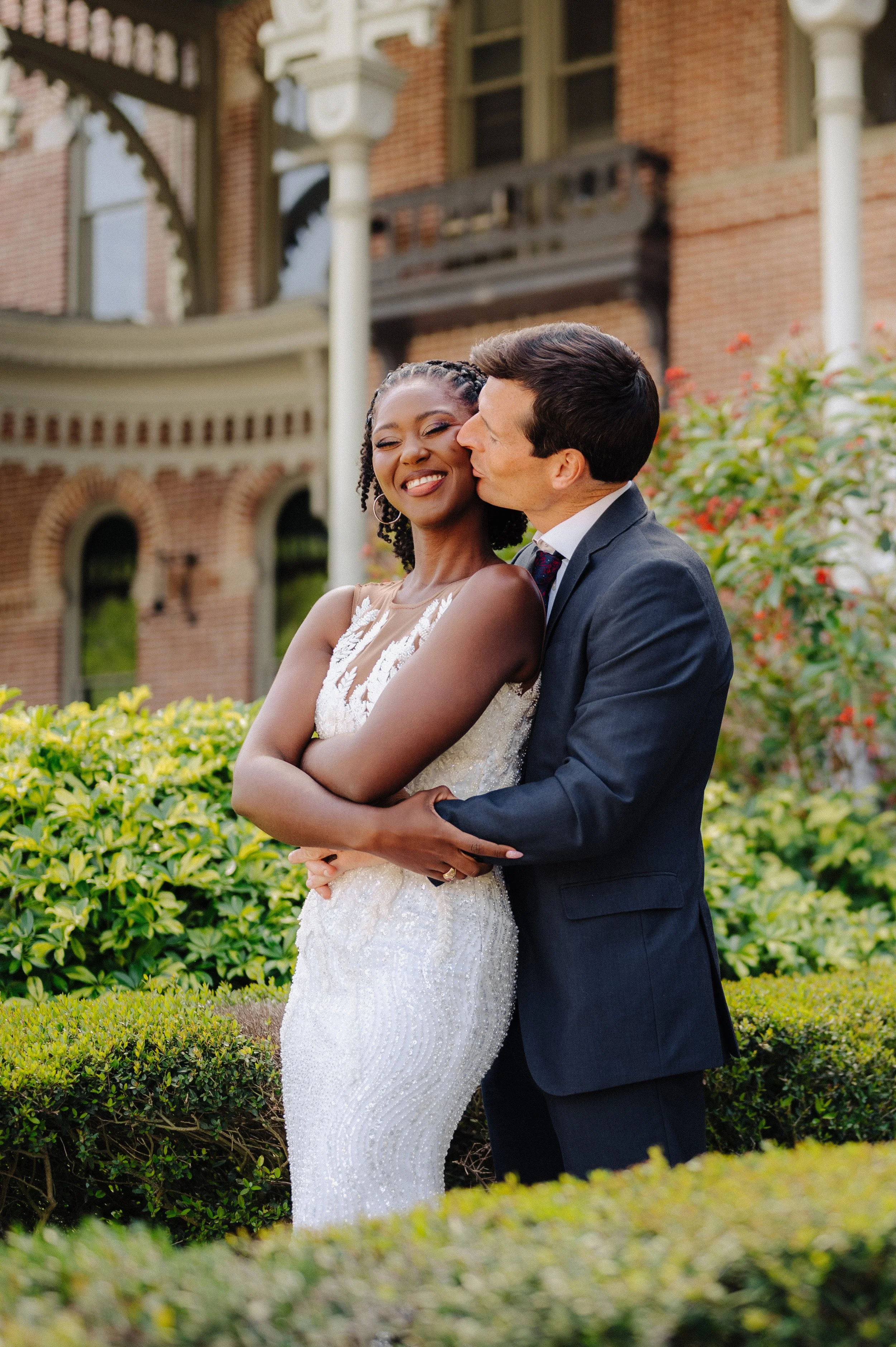 Elegant soft glam bridal makeup on black bride at Tampa Bay riverside venue