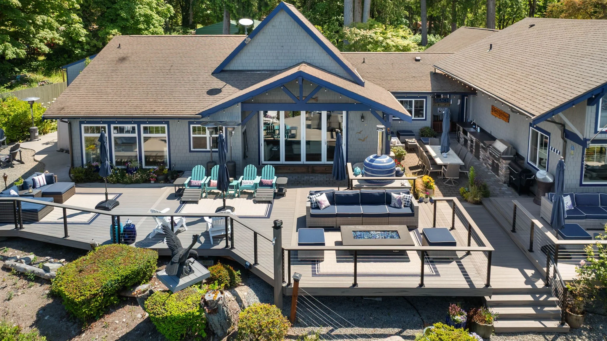 Backyard outdoor living space with custom decking and seating area