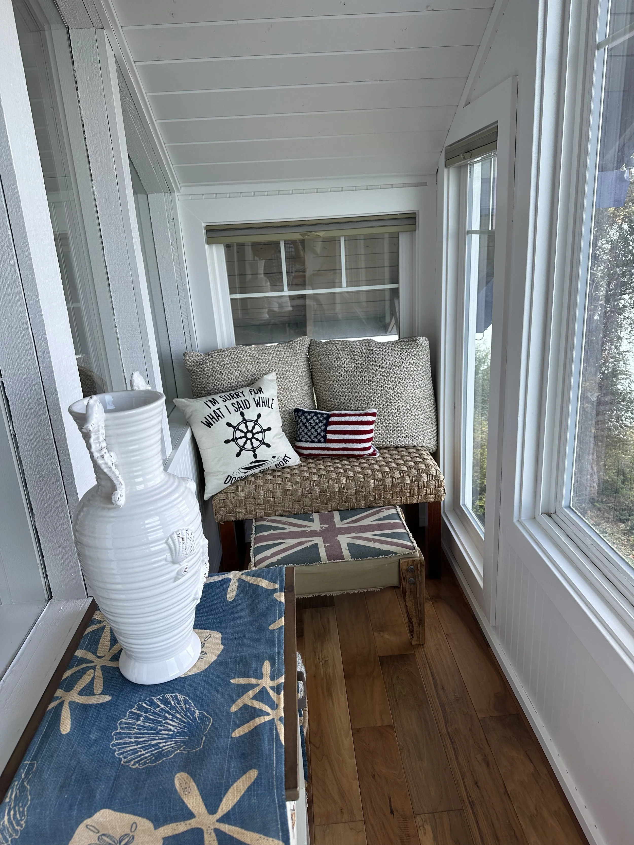 Lakebay, WA beach cottage remodel sun room with windows.